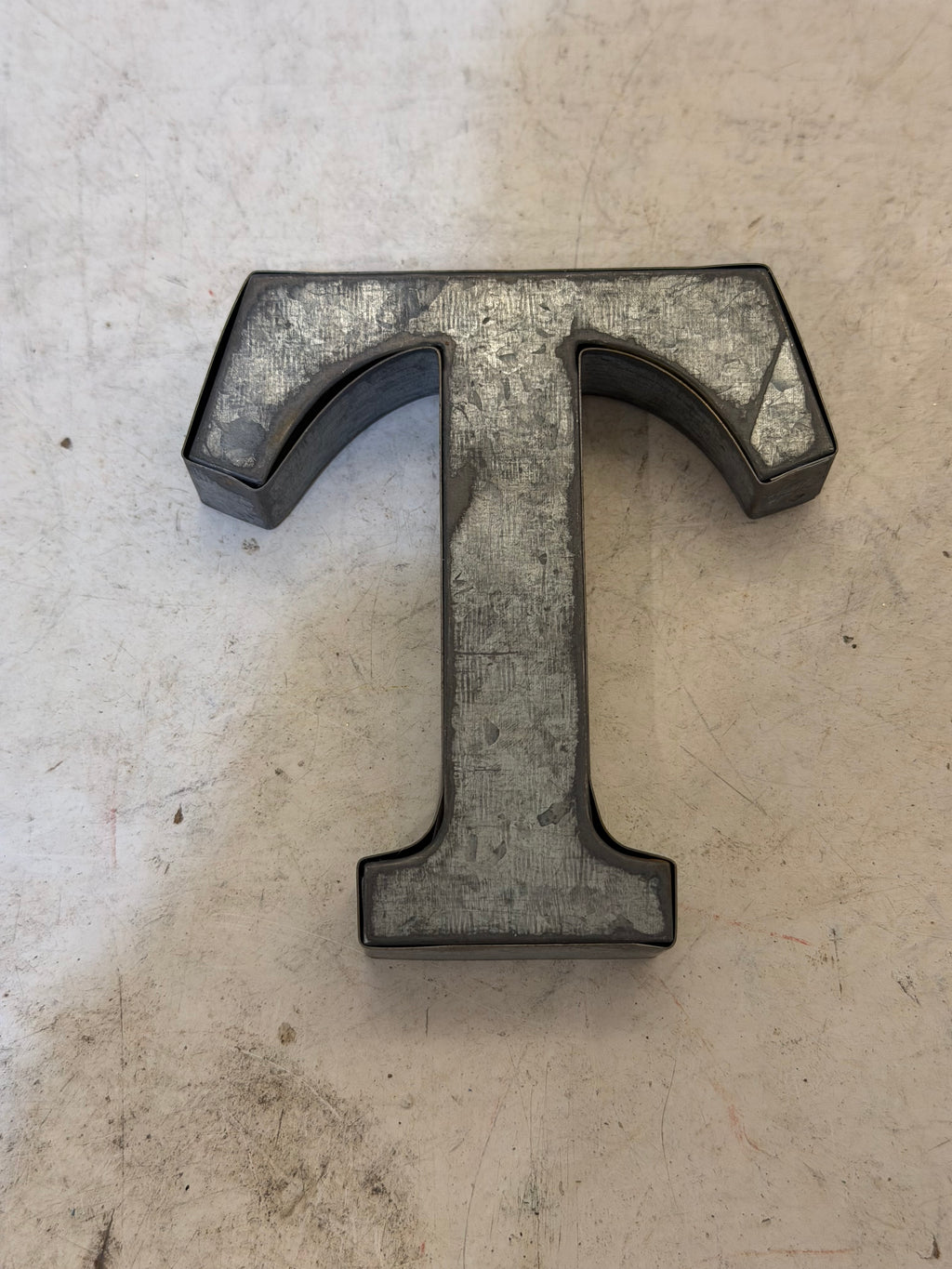 Rustic galvanized, tin letters sold individually Rusted galvanized, tin letters sold individually 3-3/4” - hanging hardware on back