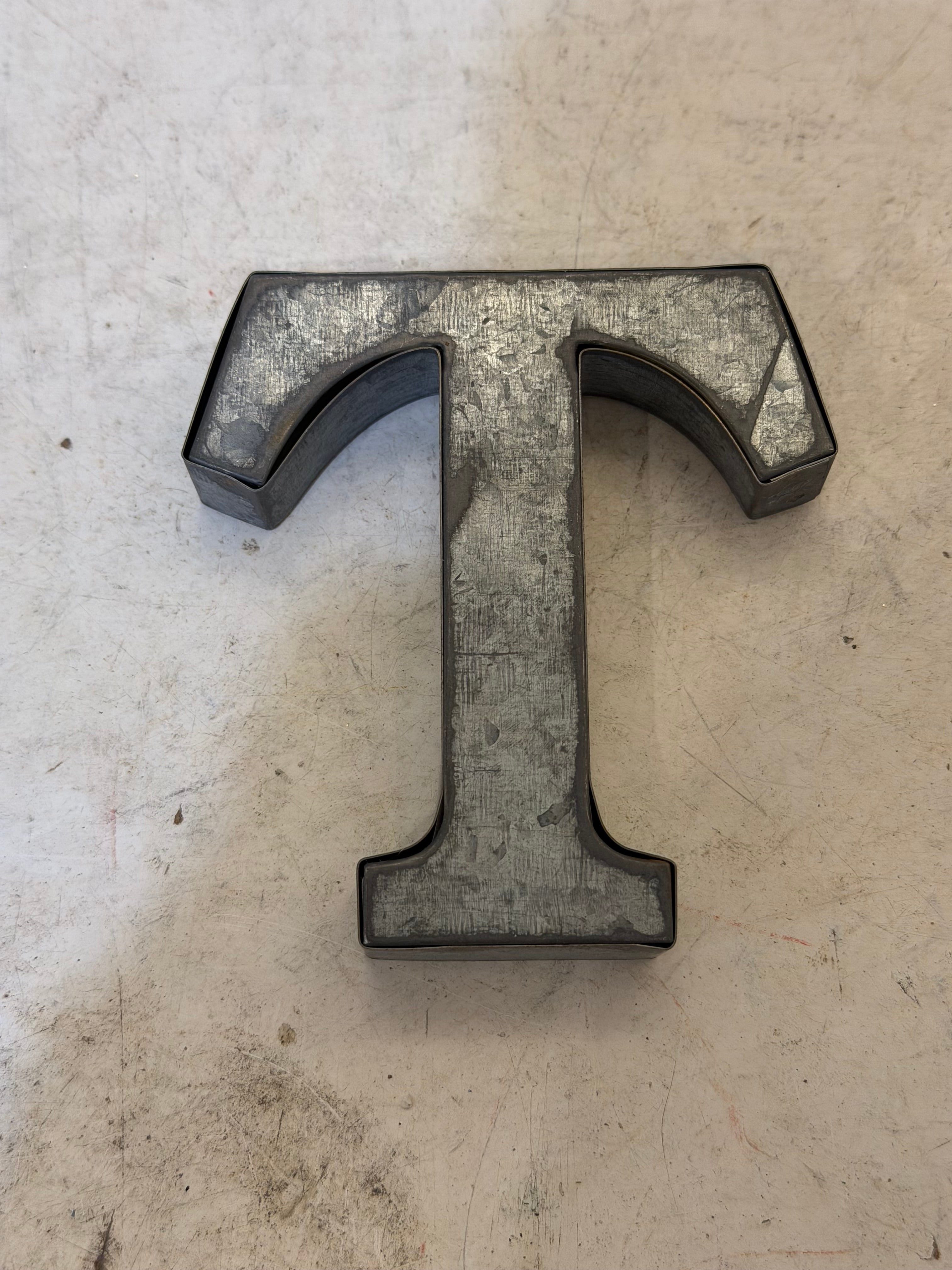 Rustic galvanized, tin letters sold individually Rusted galvanized, tin letters sold individually 3-3/4” - hanging hardware on back