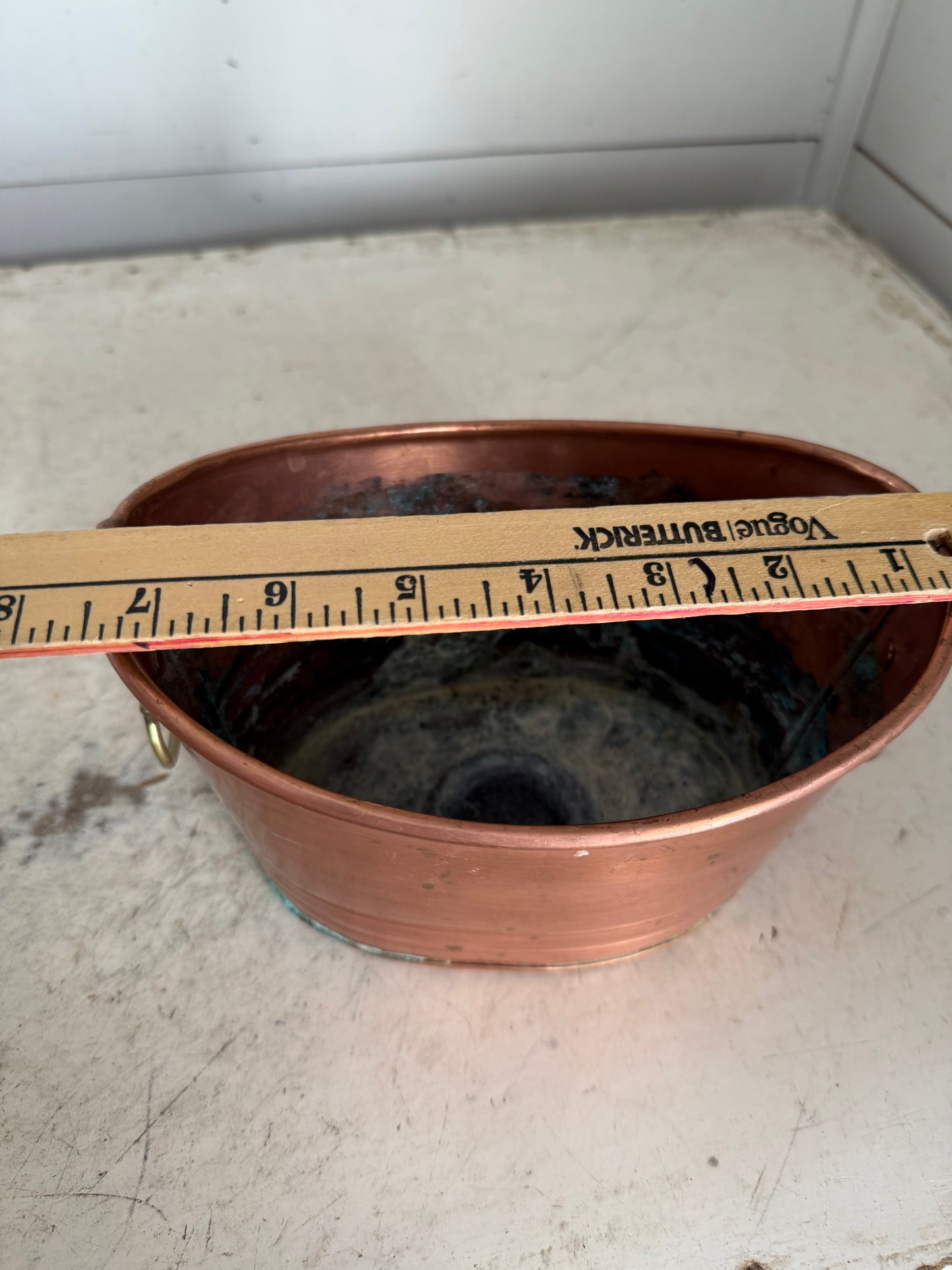 Vintage copper bucket with brass lion handles