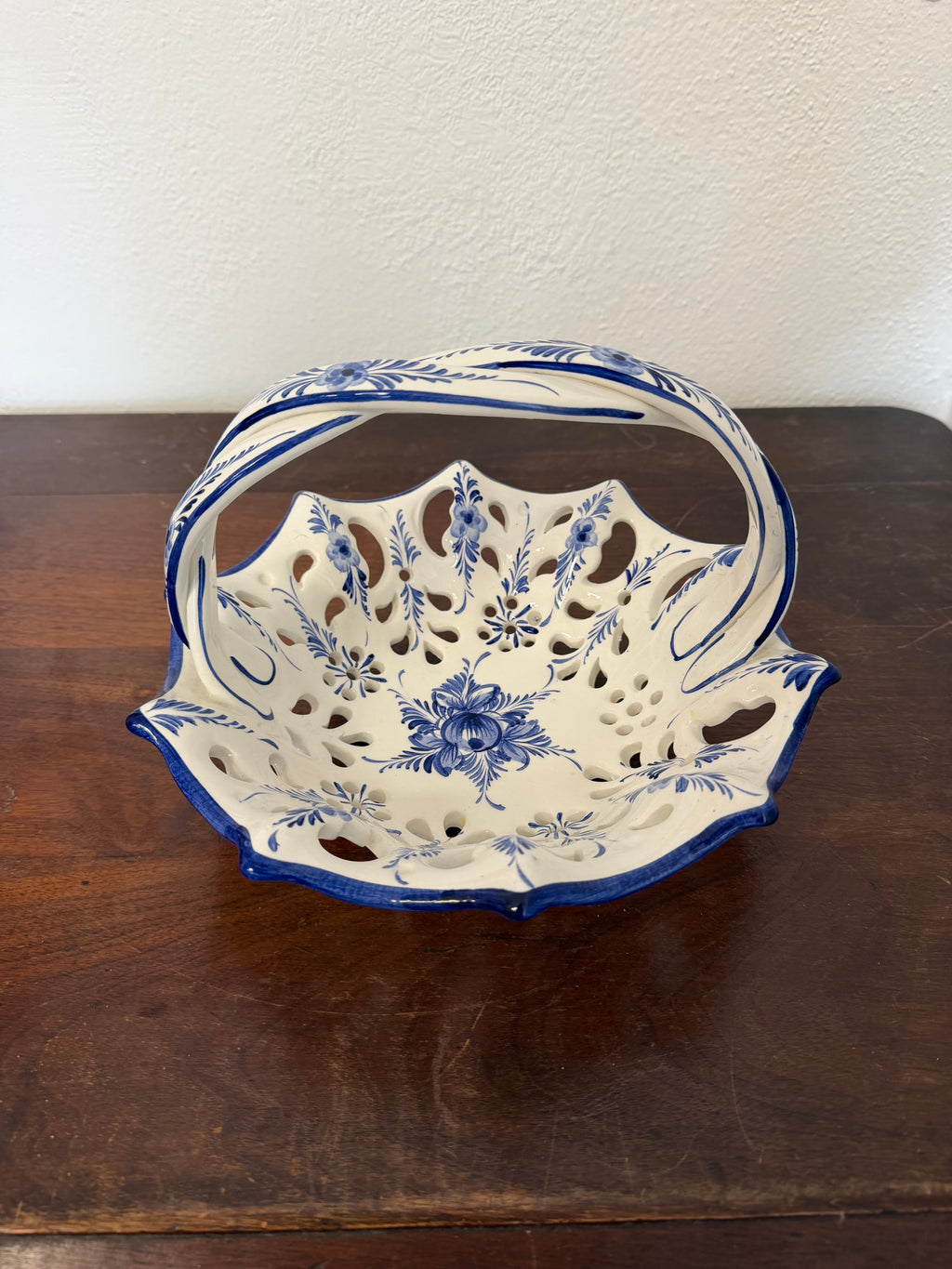 Vintage hand-painted ceramic reticulated (pierced lattice) basket or bowl with a braided handle