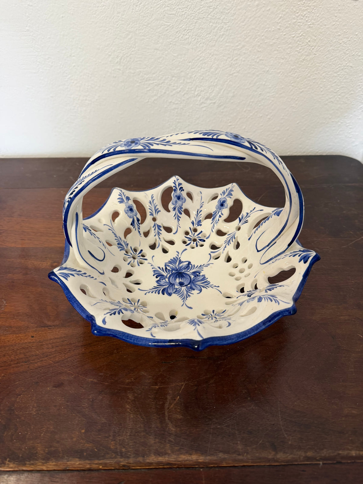 Vintage hand-painted ceramic reticulated (pierced lattice) basket or bowl with a braided handle