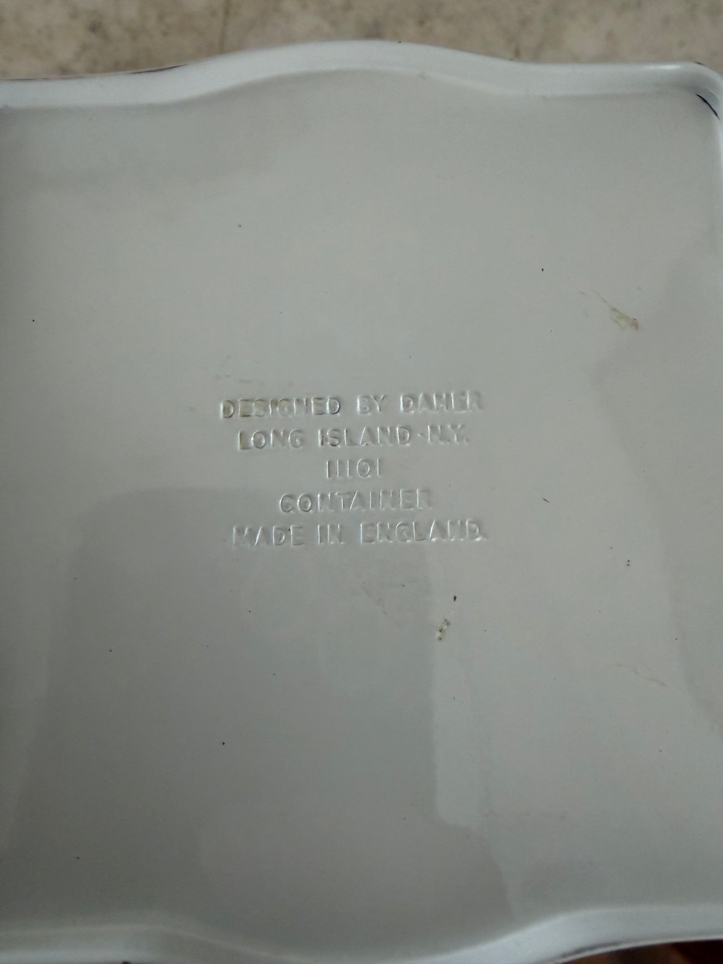 Daher decorated tin with a red and white cherry blossom pattern