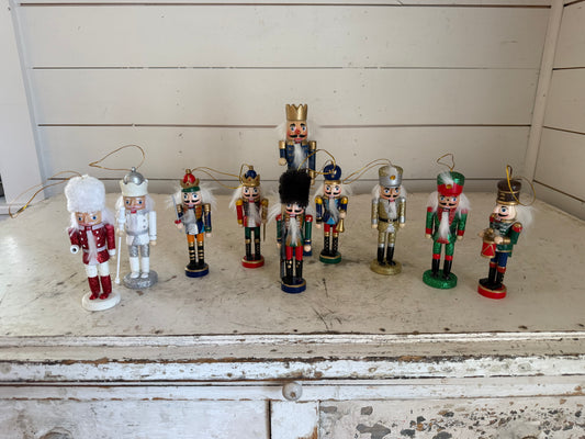 Set of nutcrackers as found one missing hand