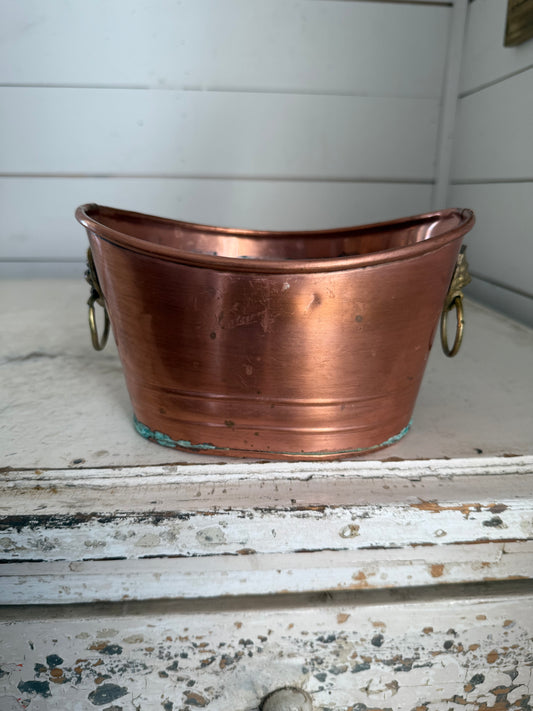 Vintage copper bucket with brass lion handles