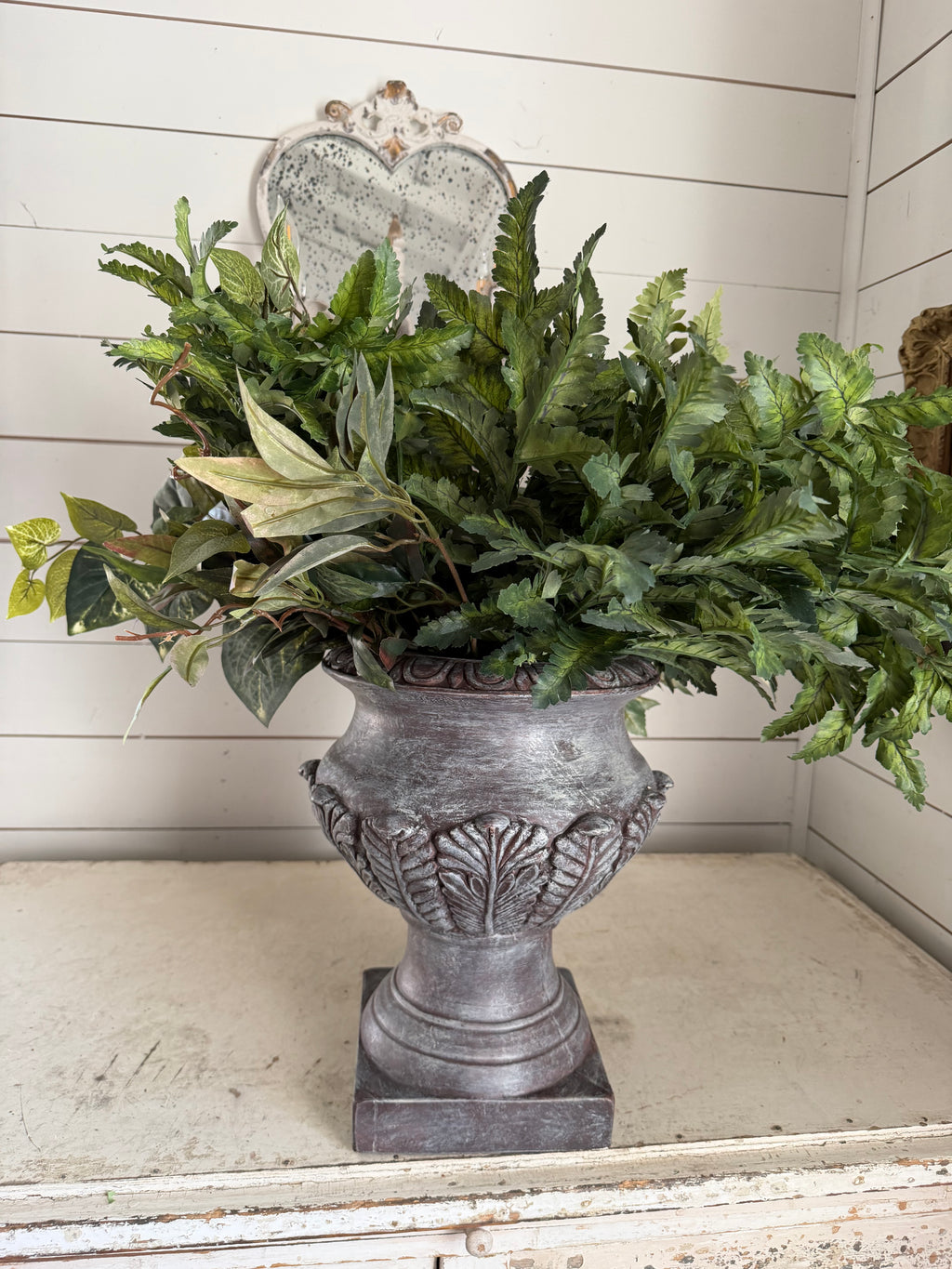 Urn with greenery included