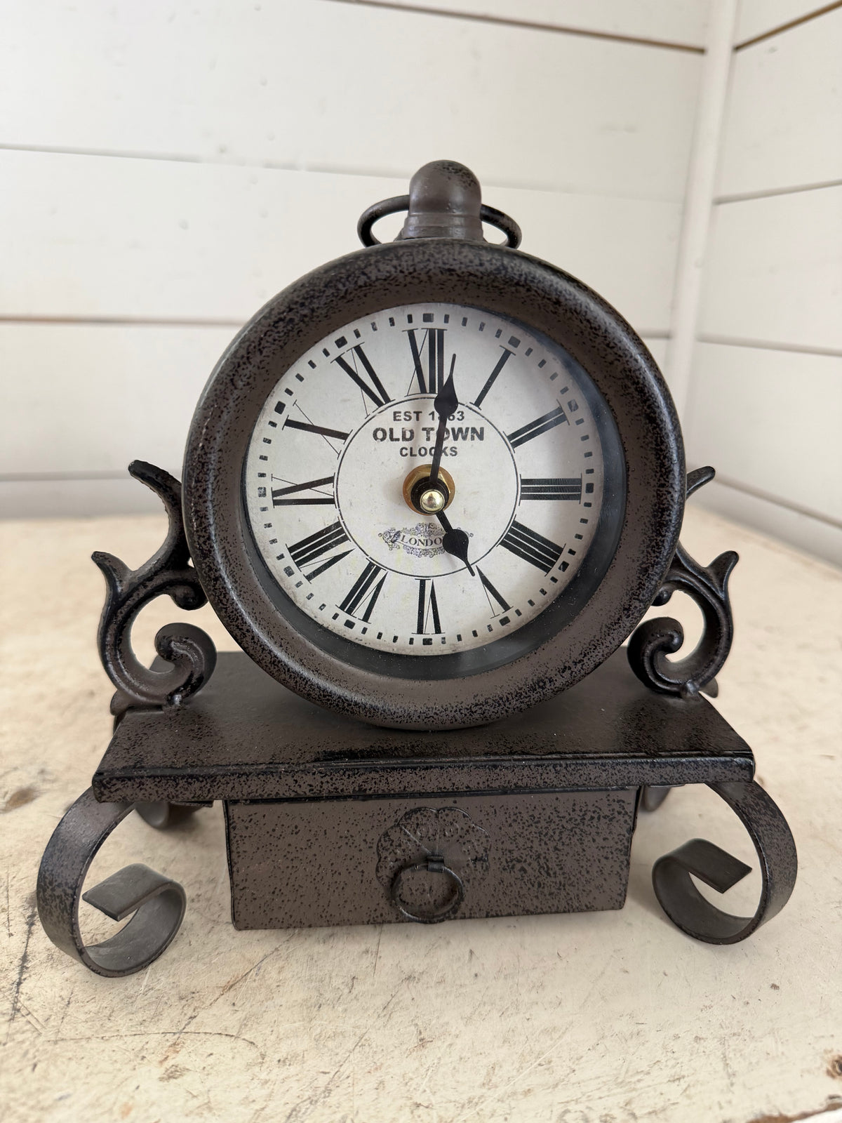 Scroll metal clock