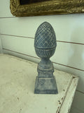 Grey finial