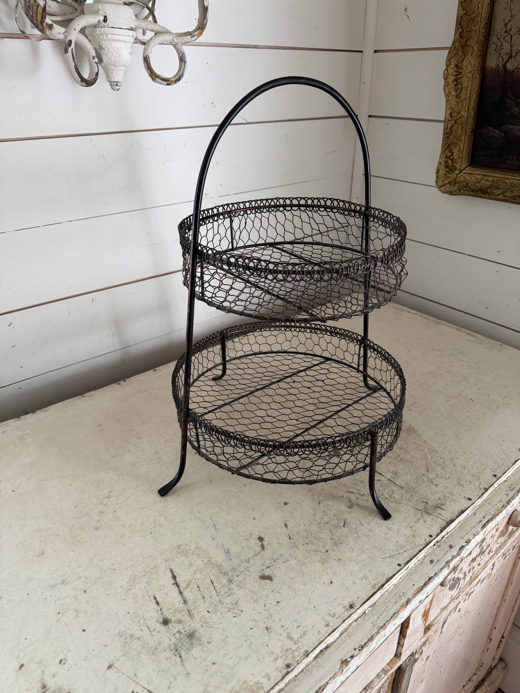 Black 2-tier wire basket with rustic chicken-wire mesh
