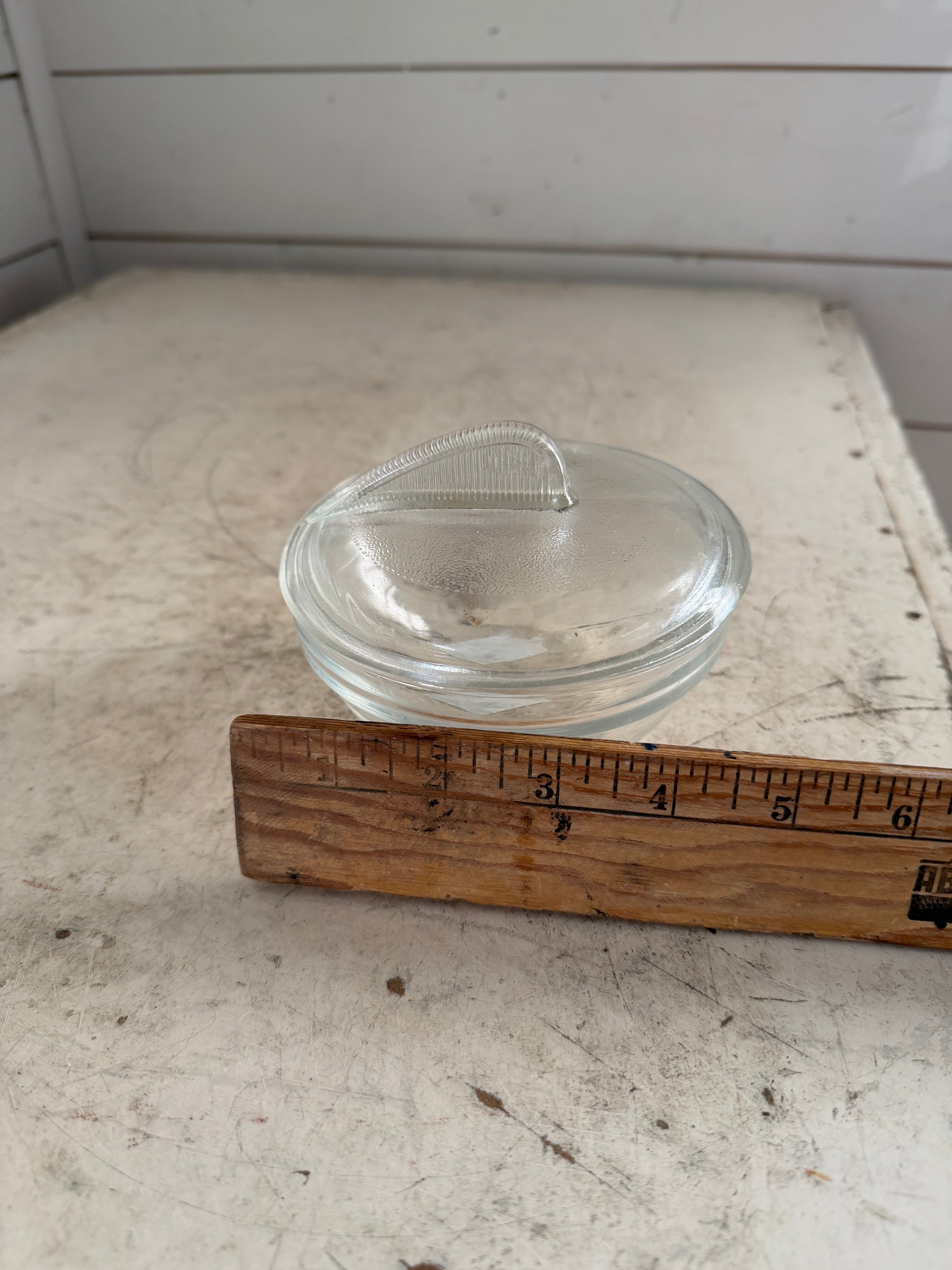 vintage Glasbake clear glass covered serving dish with fin