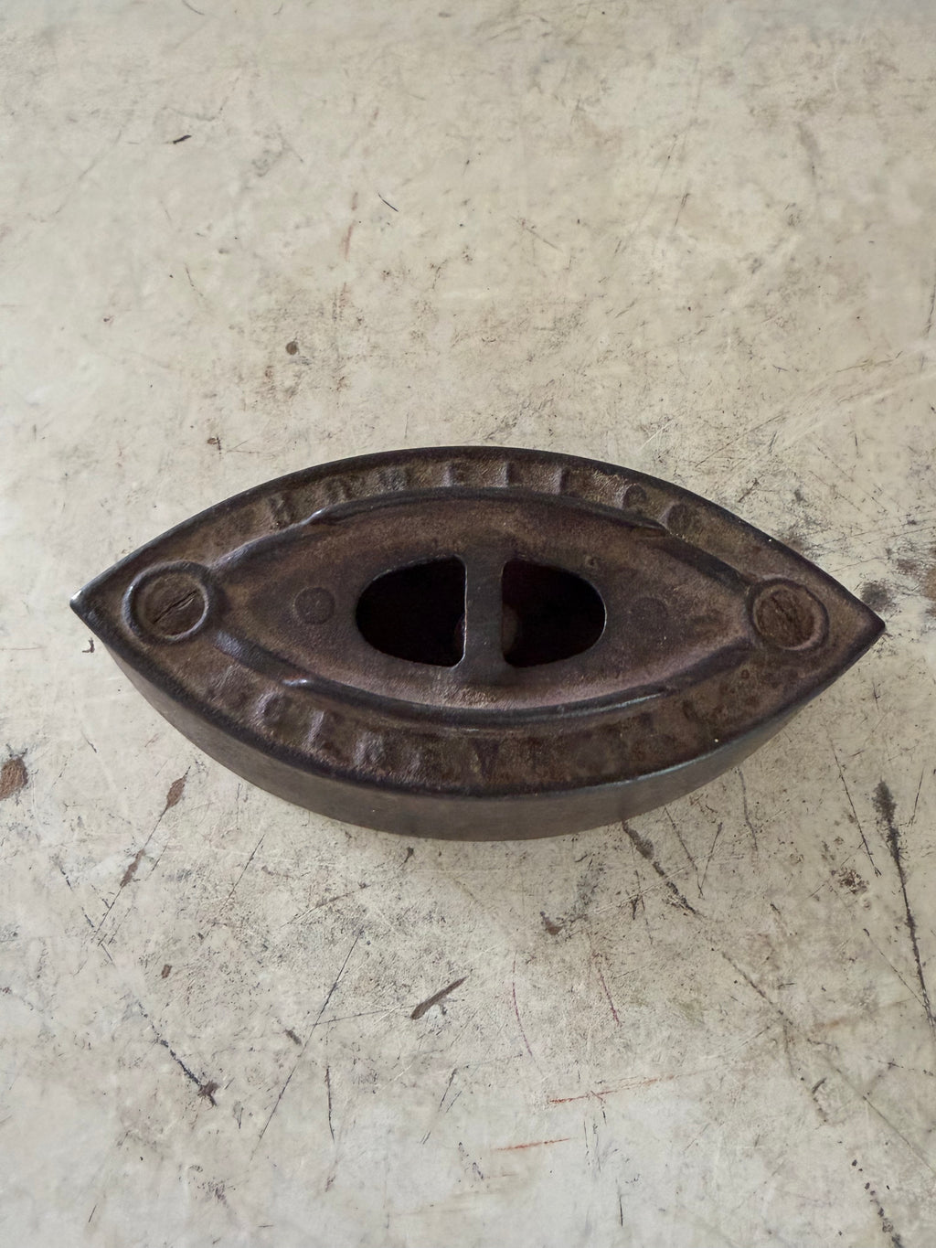 Antique Vintage Cast Iron Howell