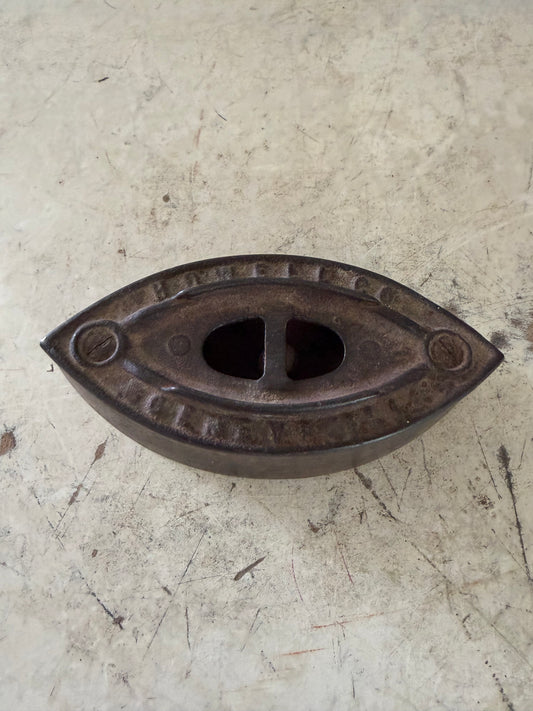 Antique Vintage Cast Iron Howell