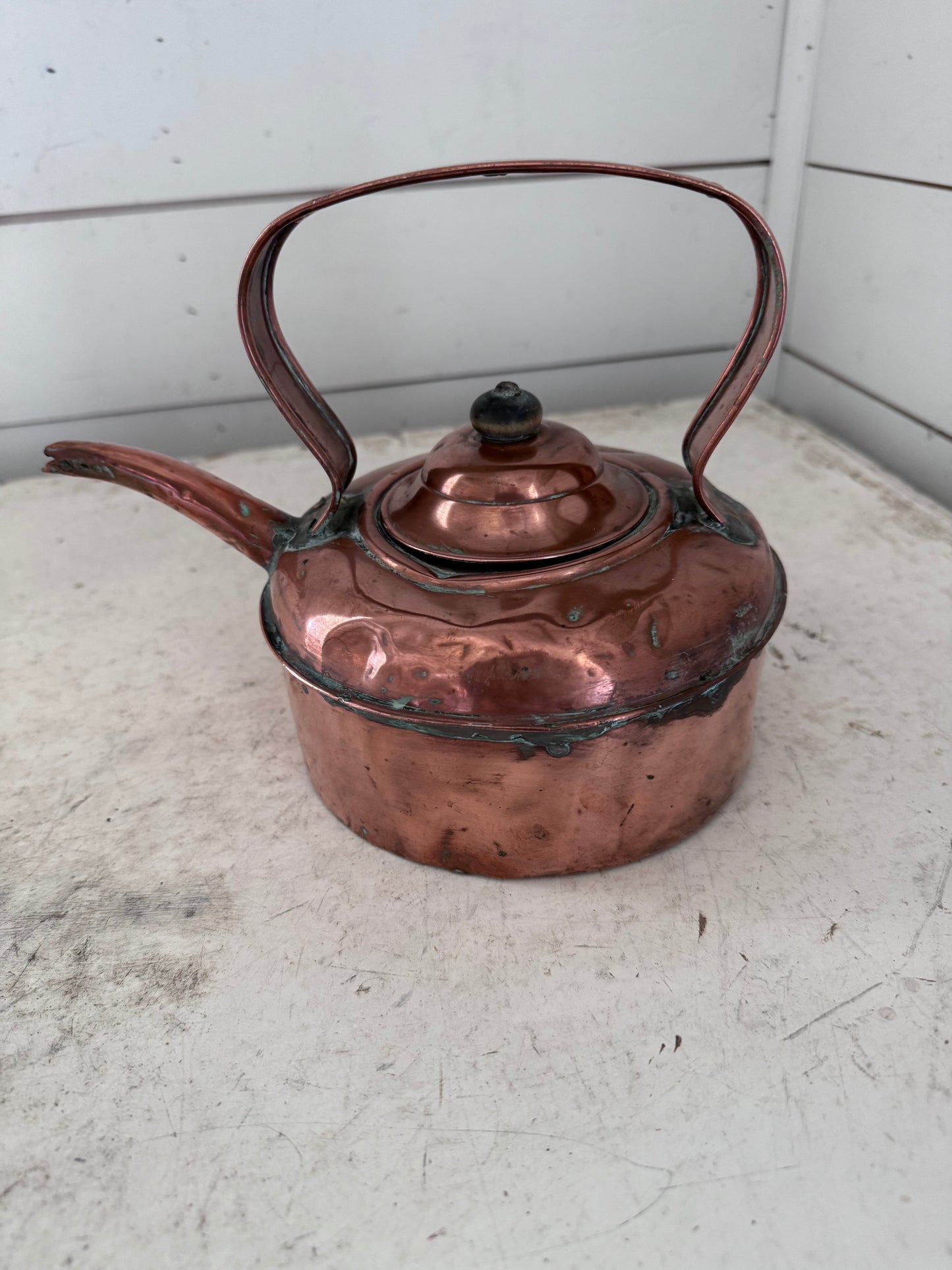 Copper kettle with flat copper strap handle