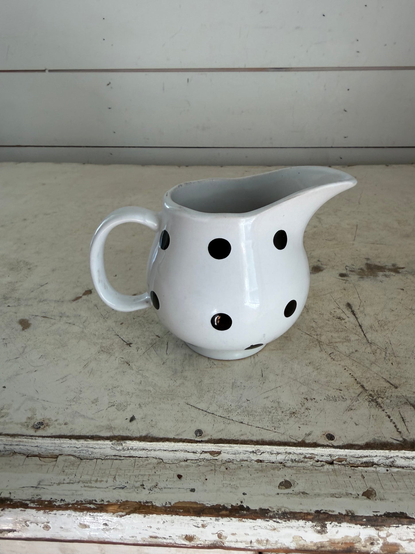 White creamer with Black Polka Dots