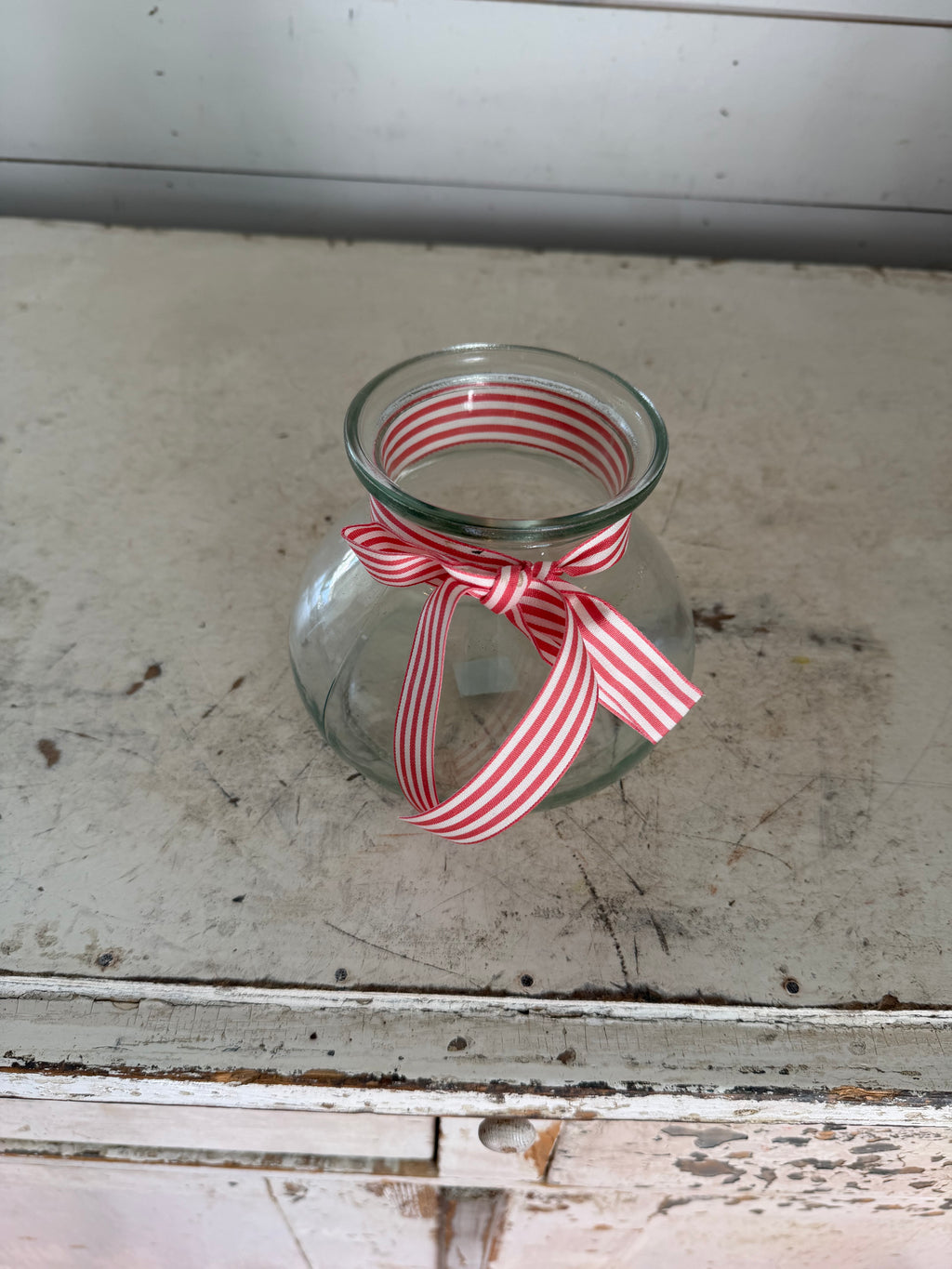 Vintage Green Glass Style Vase with red and white ribbon