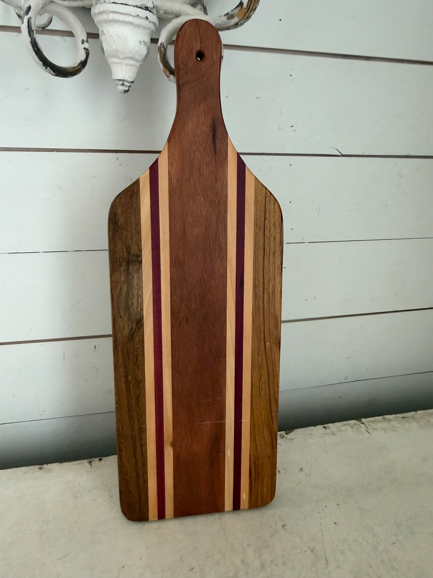 Paddle-style Charcuterie Board Handcrafted from Walnut, Maple, and Purple Heart