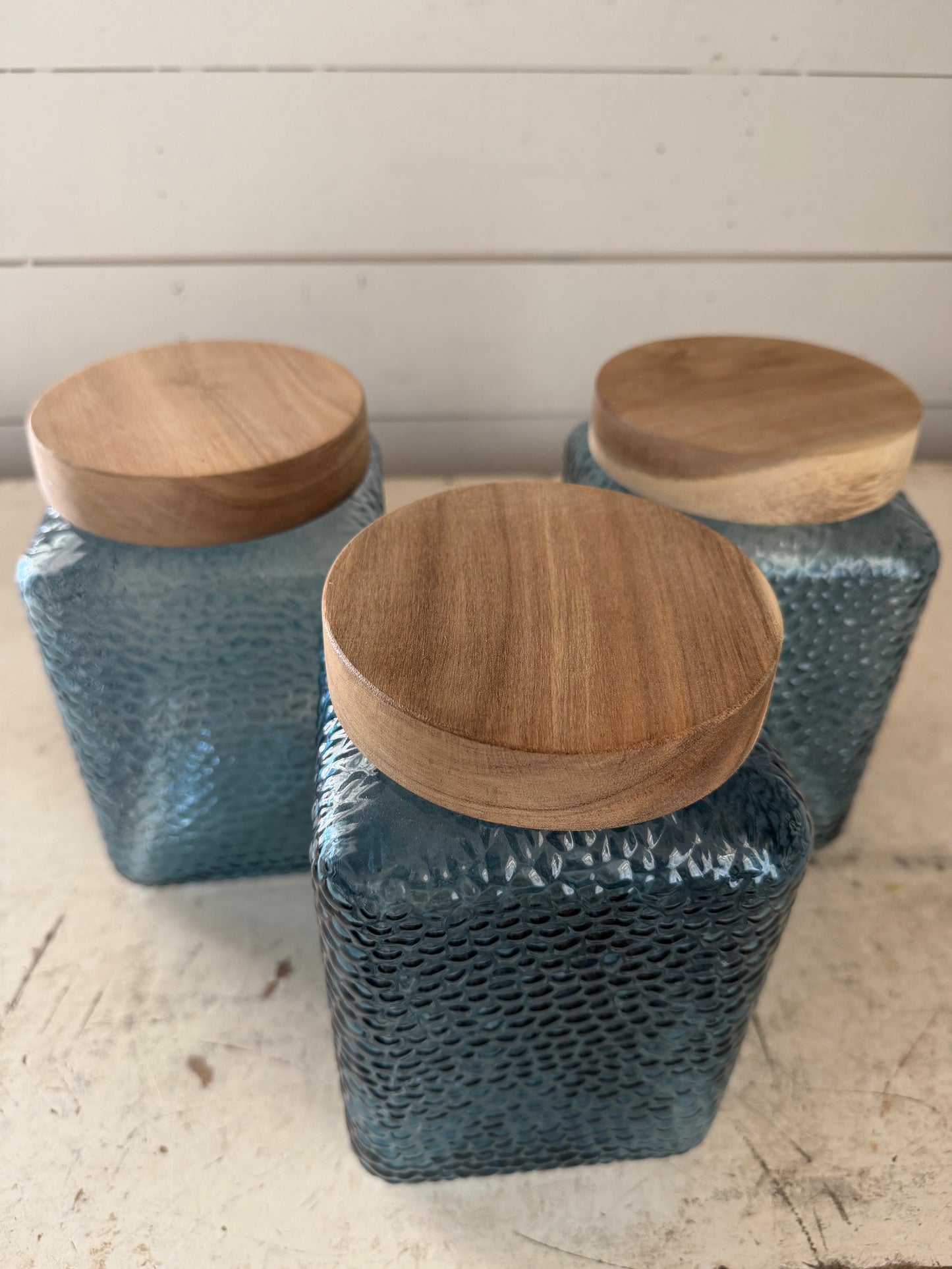 Blue canister with wooden lid sold individually