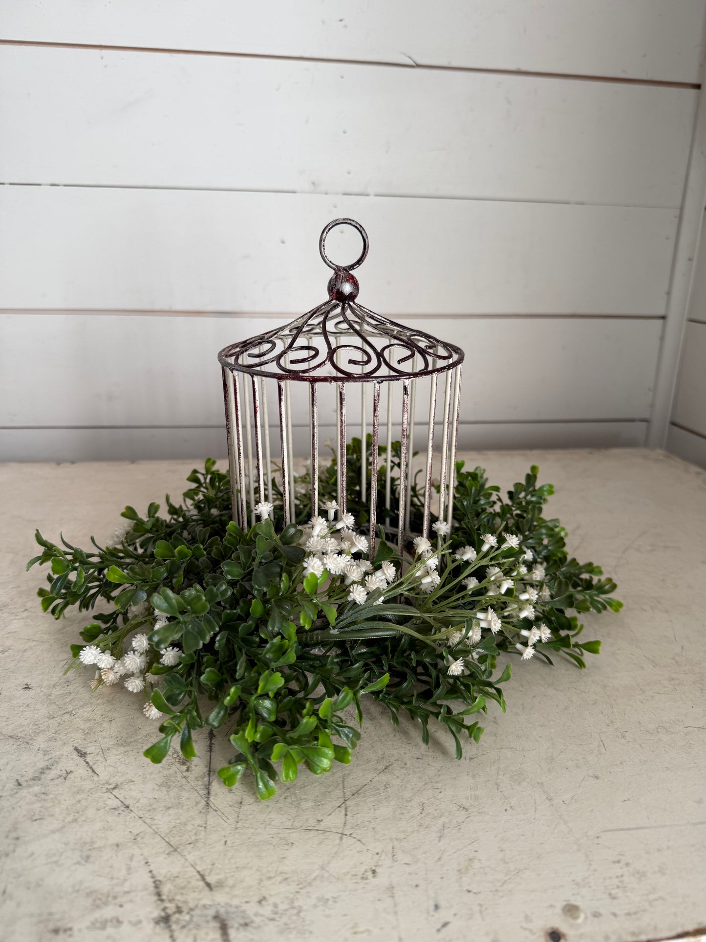 Birdcage with wreath