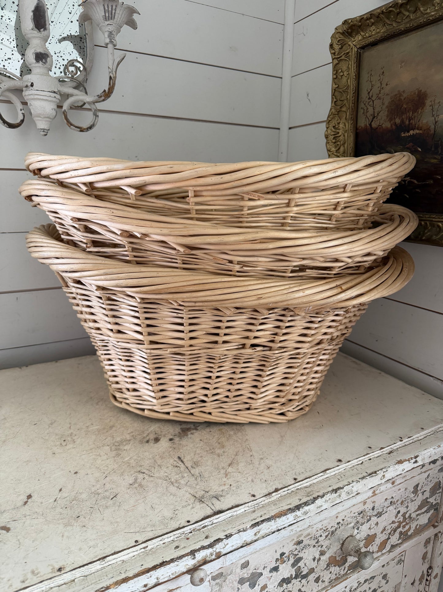 Set of three French style laundry baskets