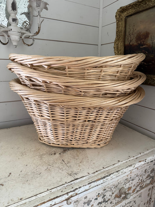 Set of three French style laundry baskets