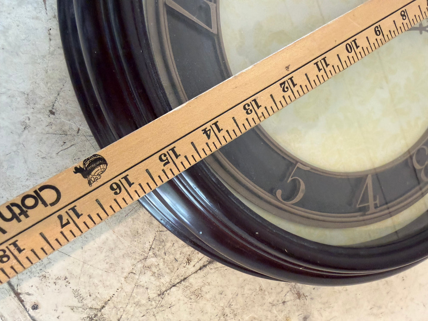 Round clock will have clock removed and get makeover with art