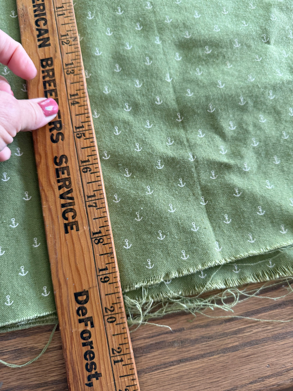 20 inches green fabric with little anchors