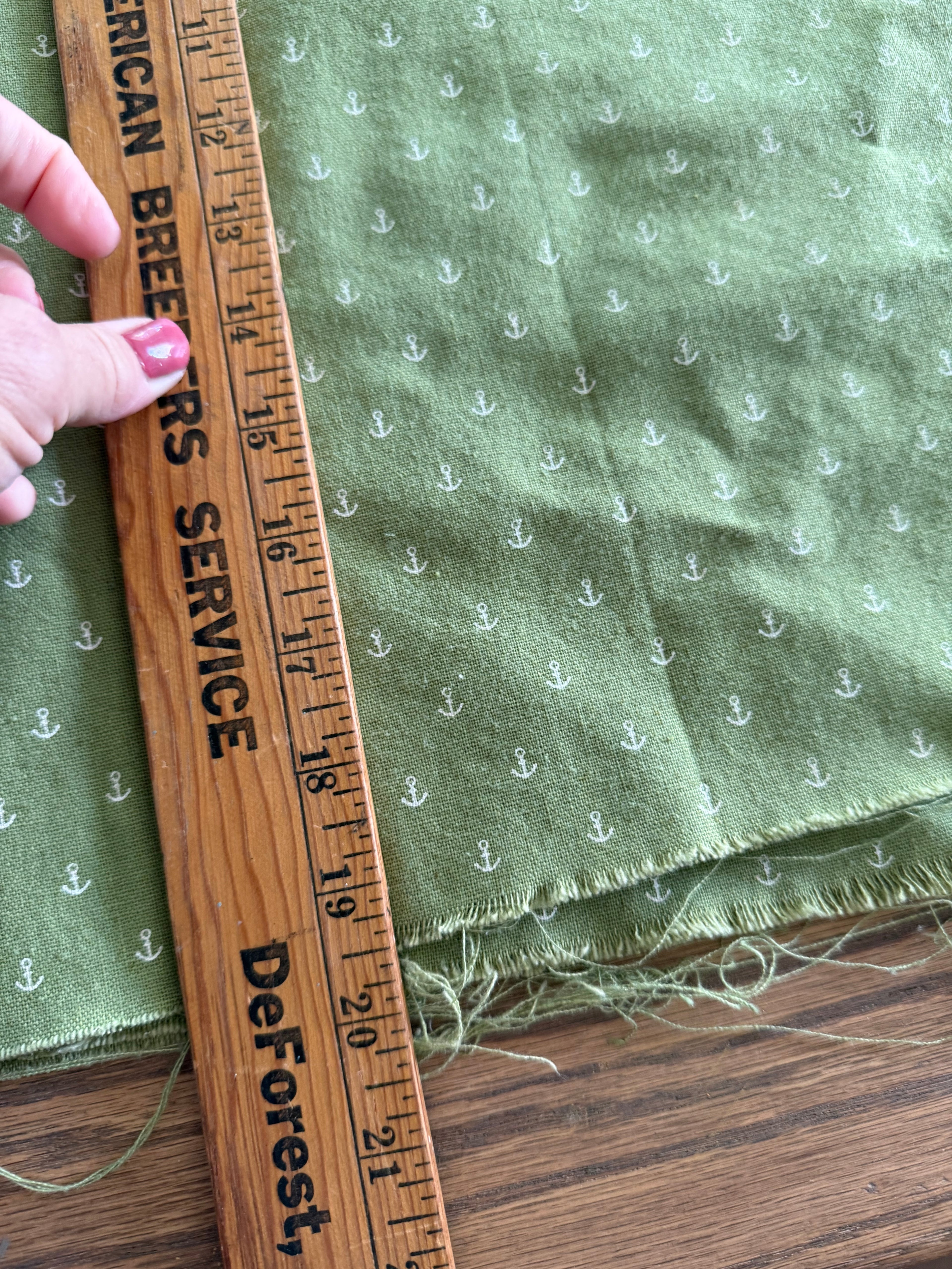 20 inches green fabric with little anchors