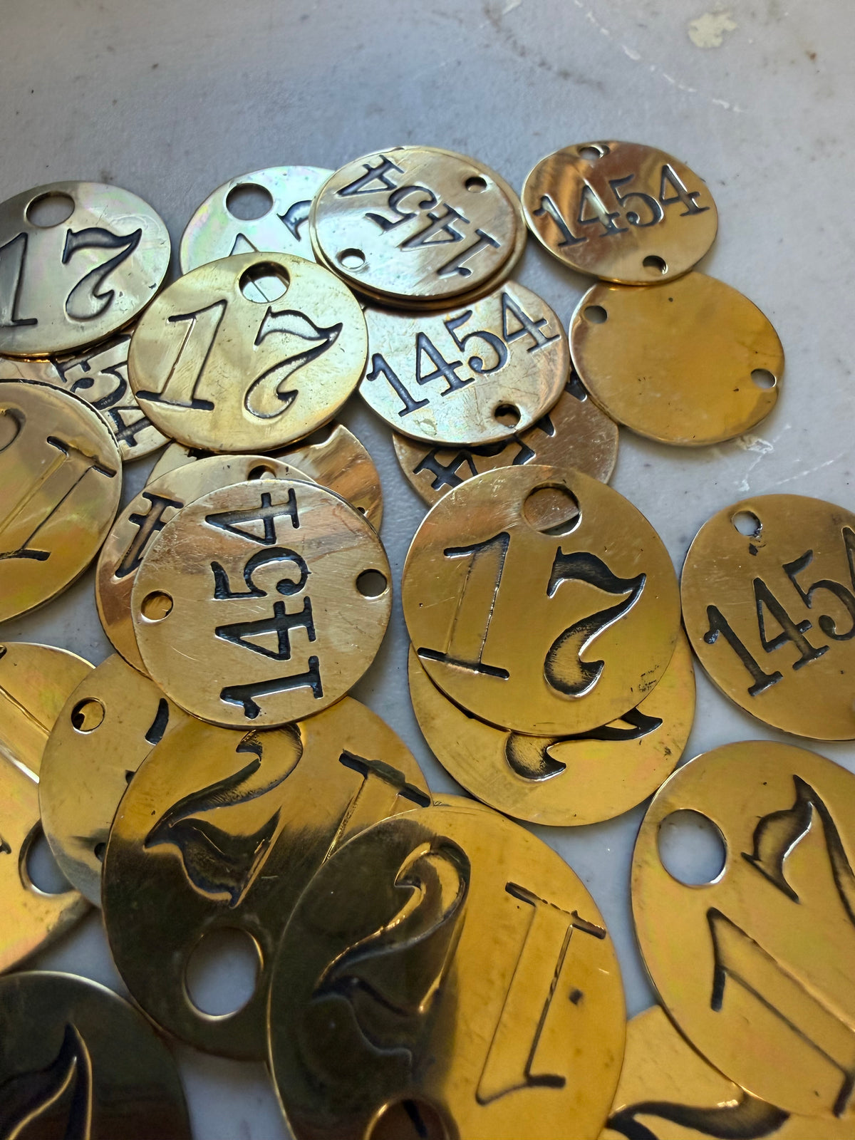 Set of 26 brass locker tags