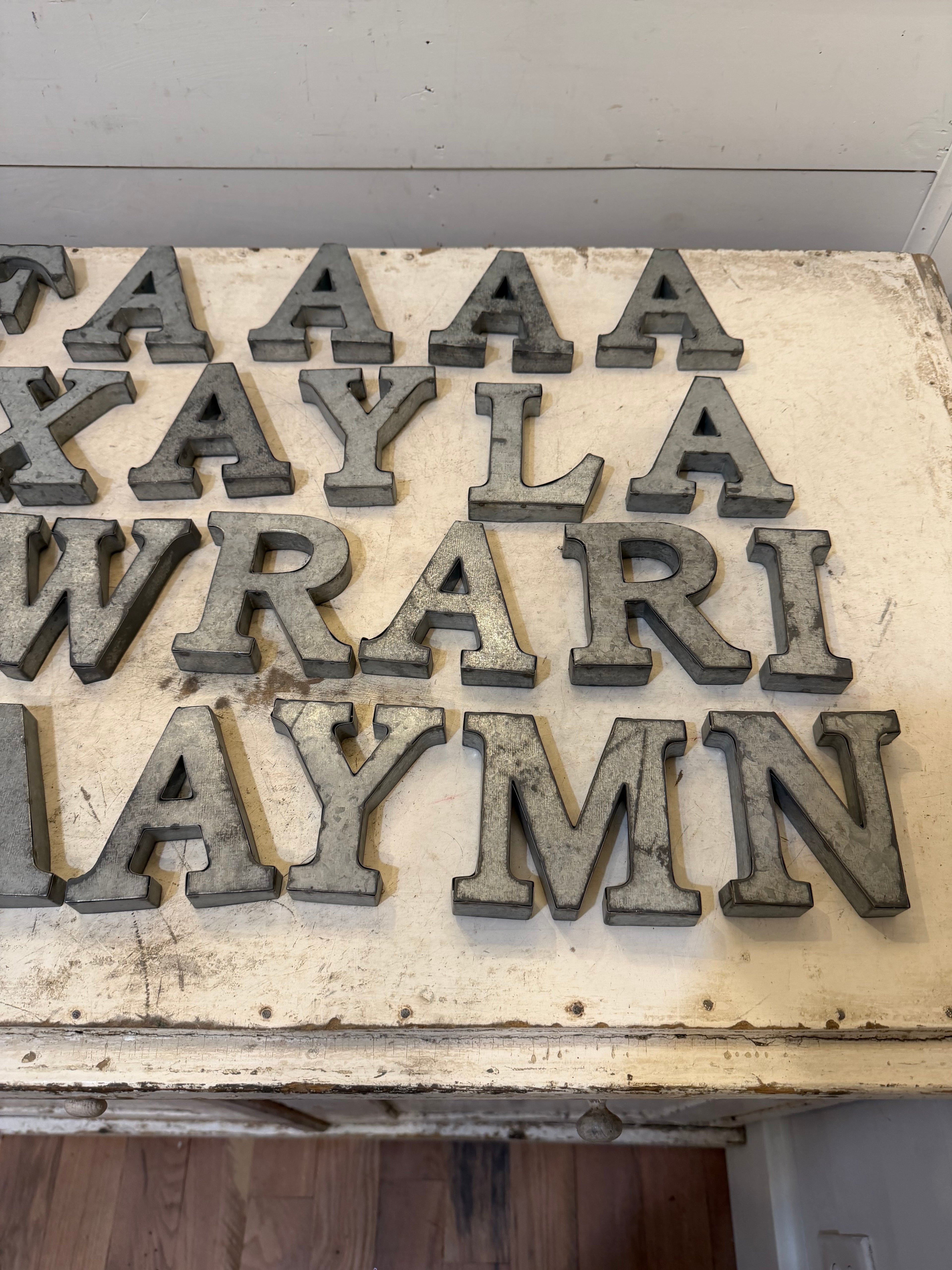 Rustic galvanized, tin letters sold individually Rusted galvanized, tin letters sold individually 3-3/4” - hanging hardware on back