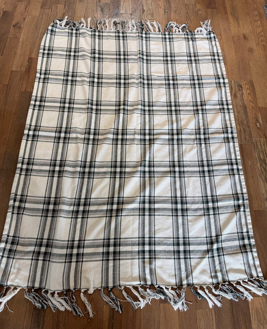 Green and white Afghan throw