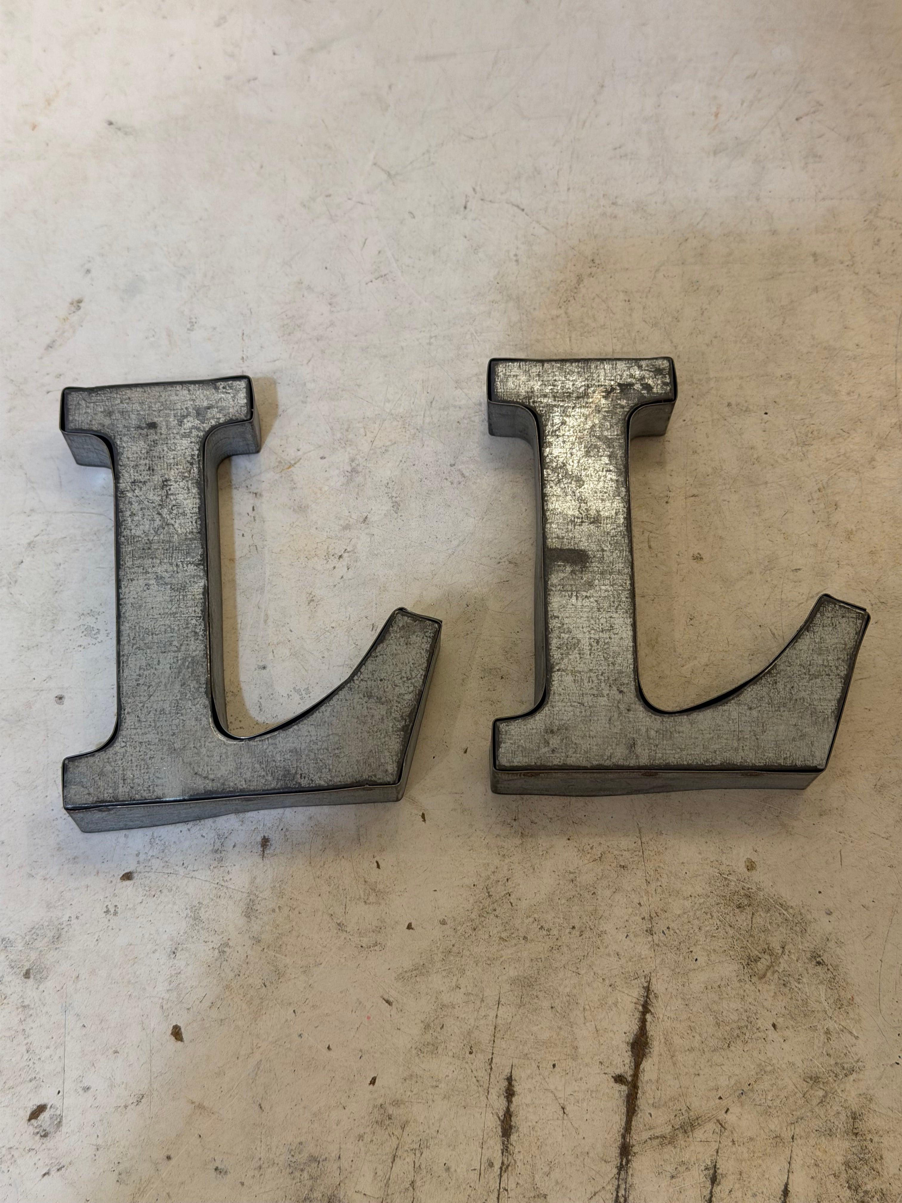 Rustic galvanized, tin letters sold individually Rusted galvanized, tin letters sold individually 3-3/4” - hanging hardware on back