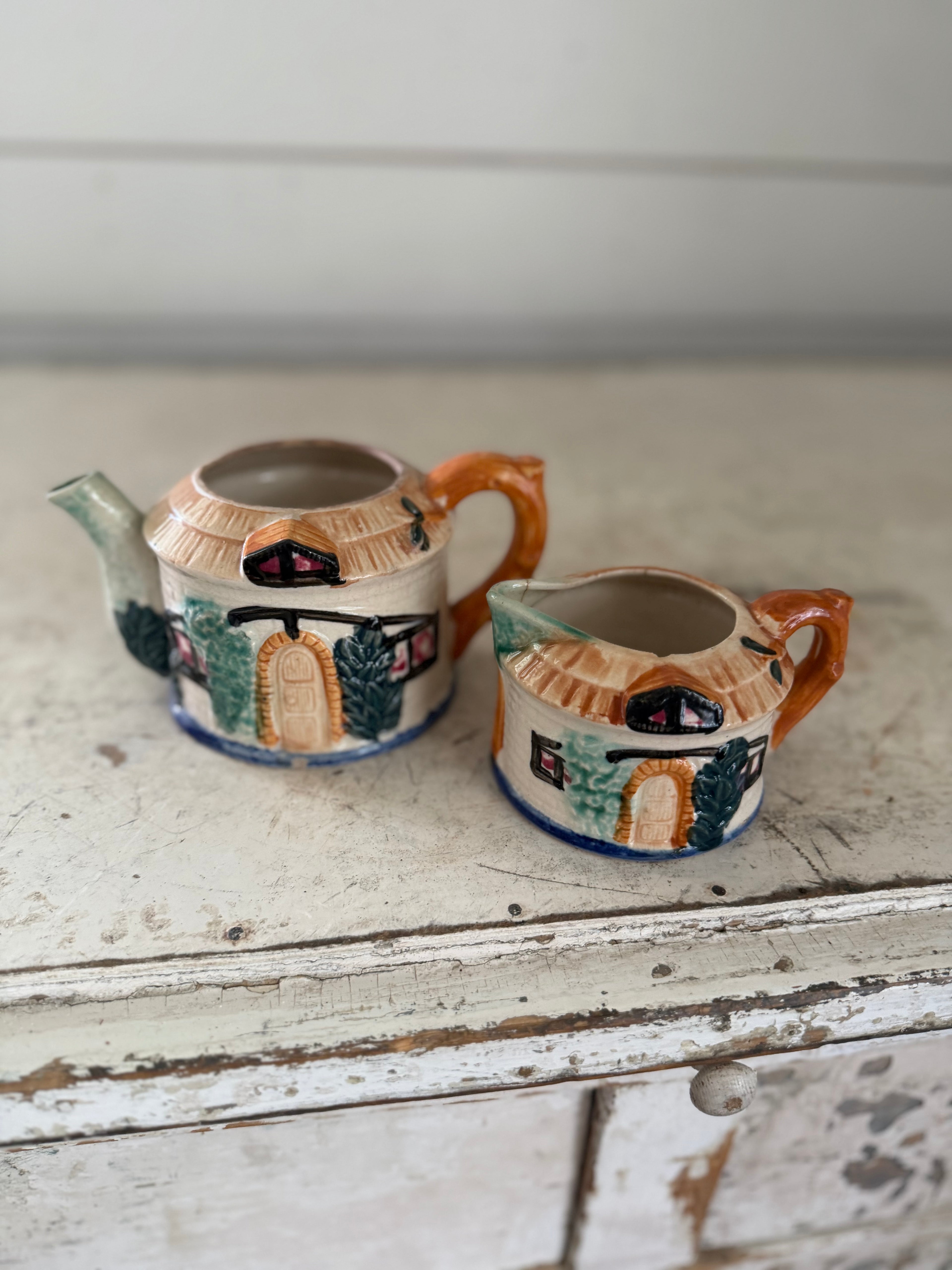 Japanese tea, pot and creamer made in Japan has cracks set