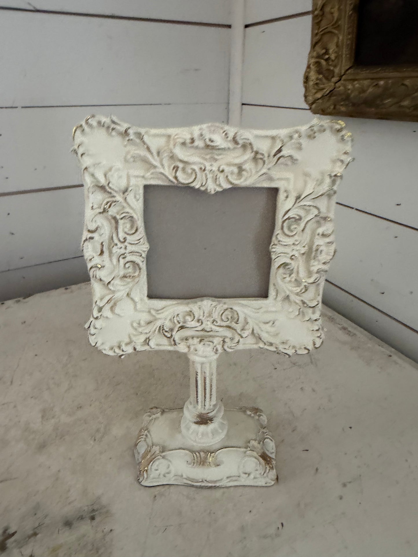 White with Gold Frame on Pedestal will get art