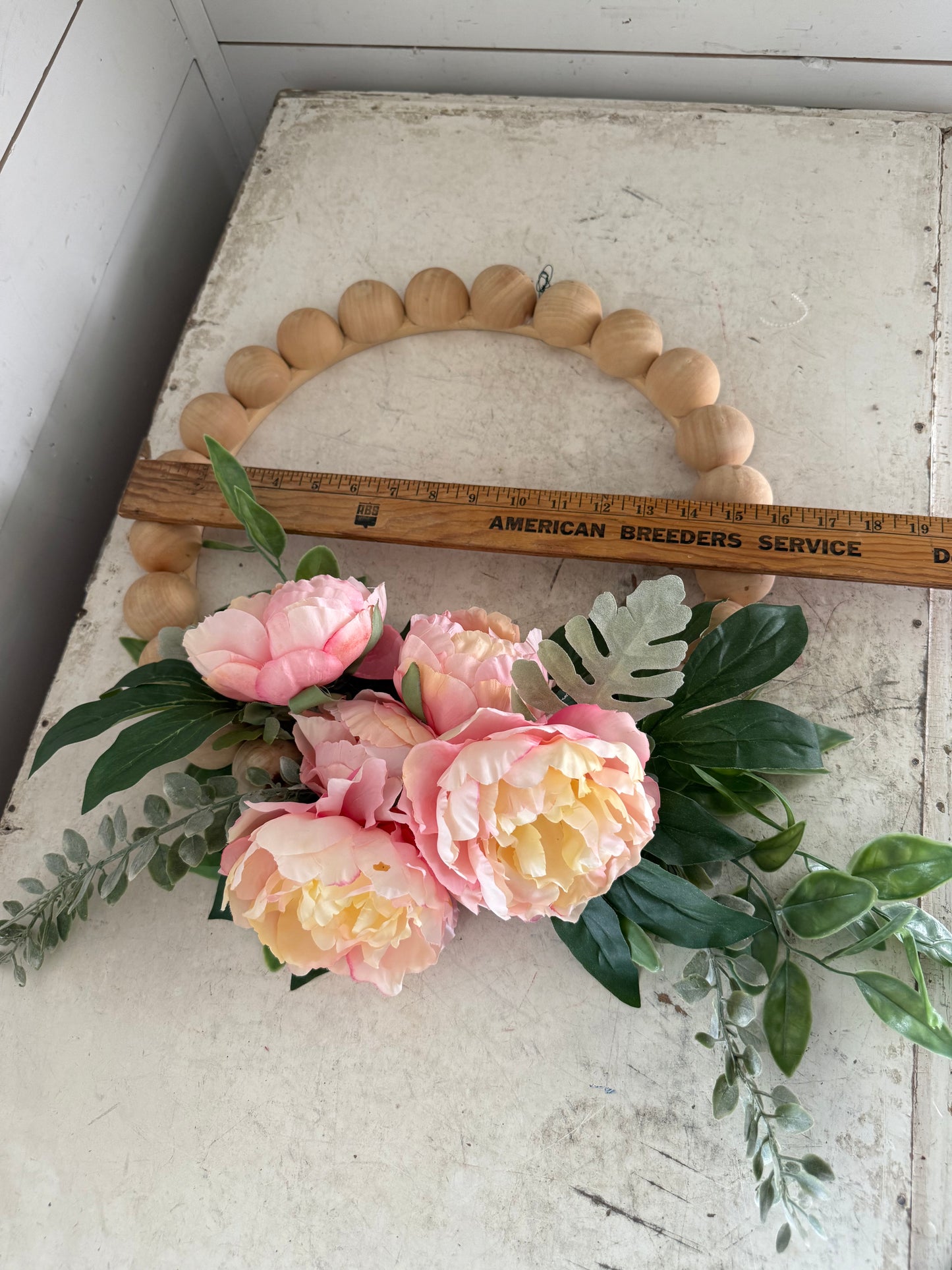 Wood bead floral wreath