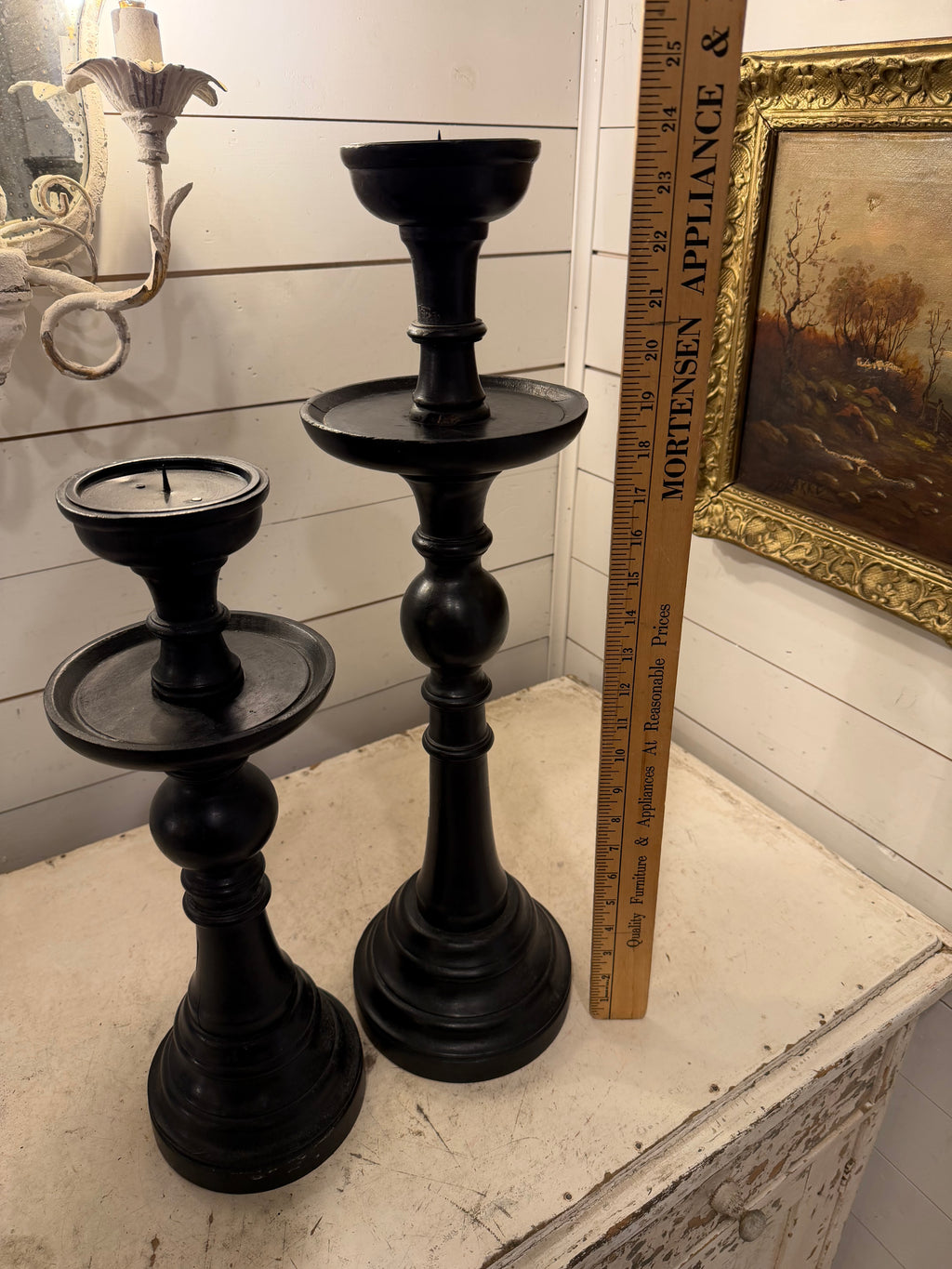 Set of black oversized pillar candleholders