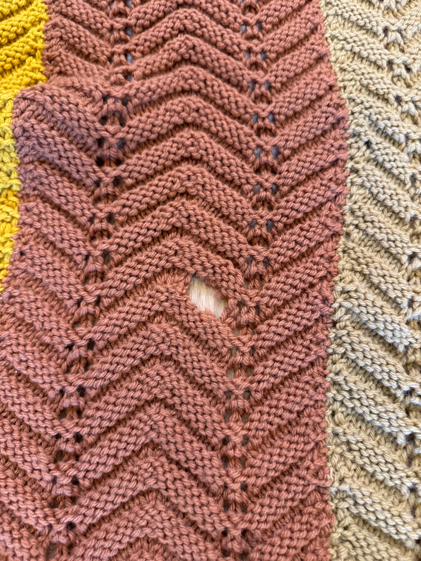 Brown Afghan zeb will sew hole