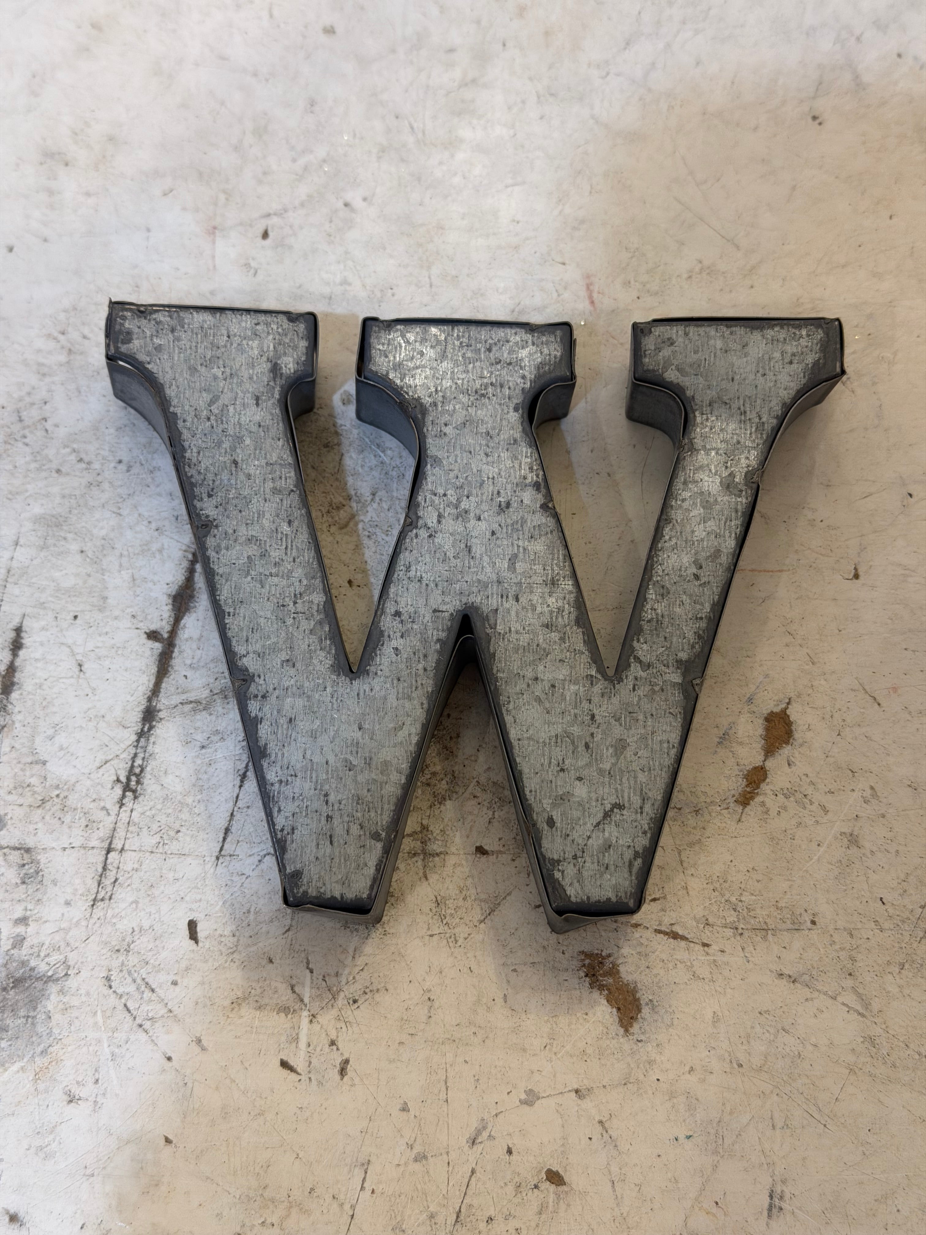 Rustic galvanized, tin letters sold individually Rusted galvanized, tin letters sold individually 3-3/4” - hanging hardware on back