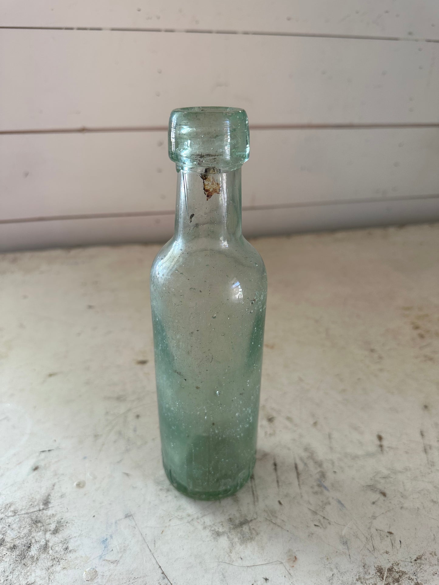 Antique English blue bottle with thick glass