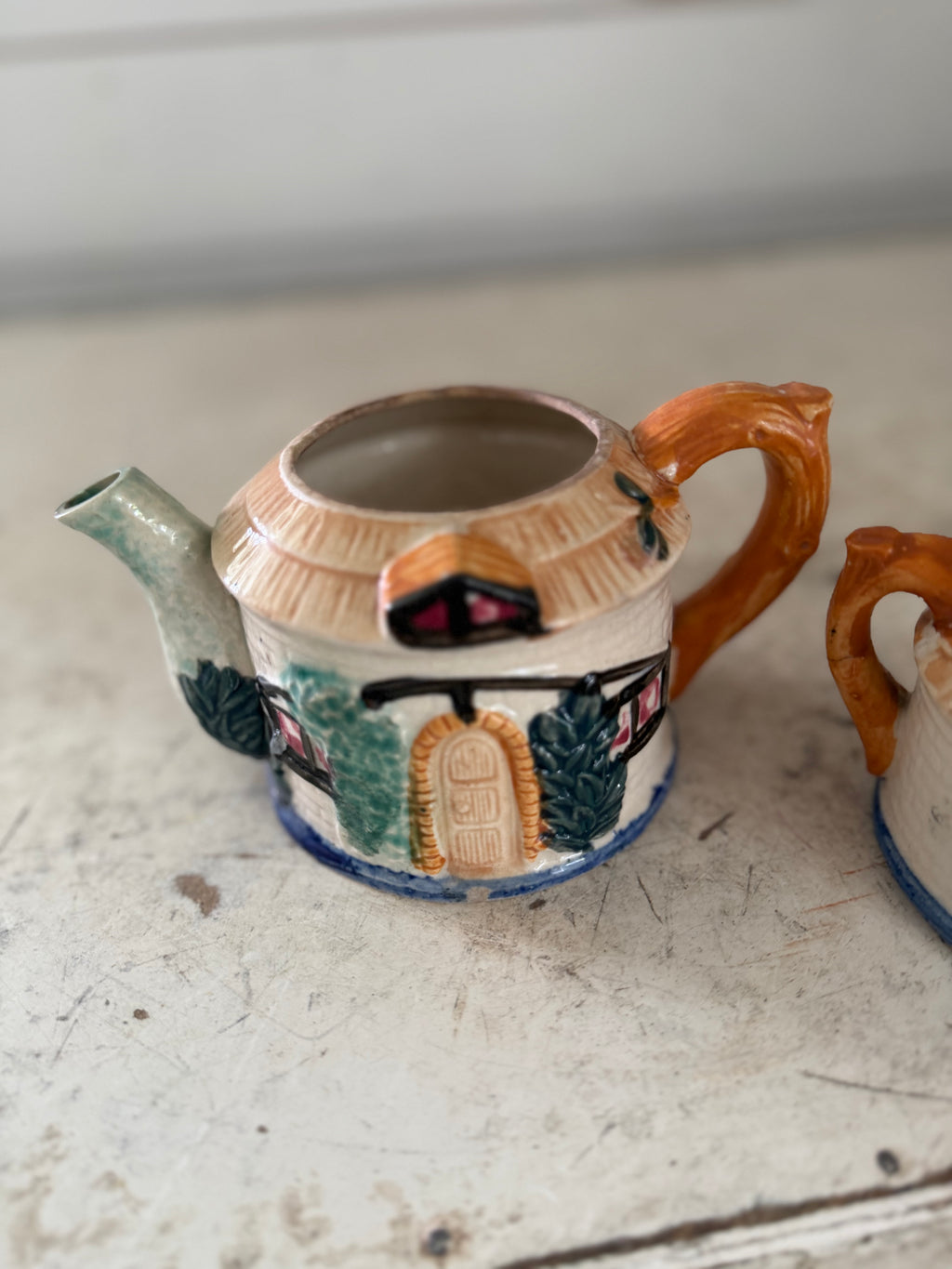 Japanese tea, pot and creamer made in Japan has cracks set