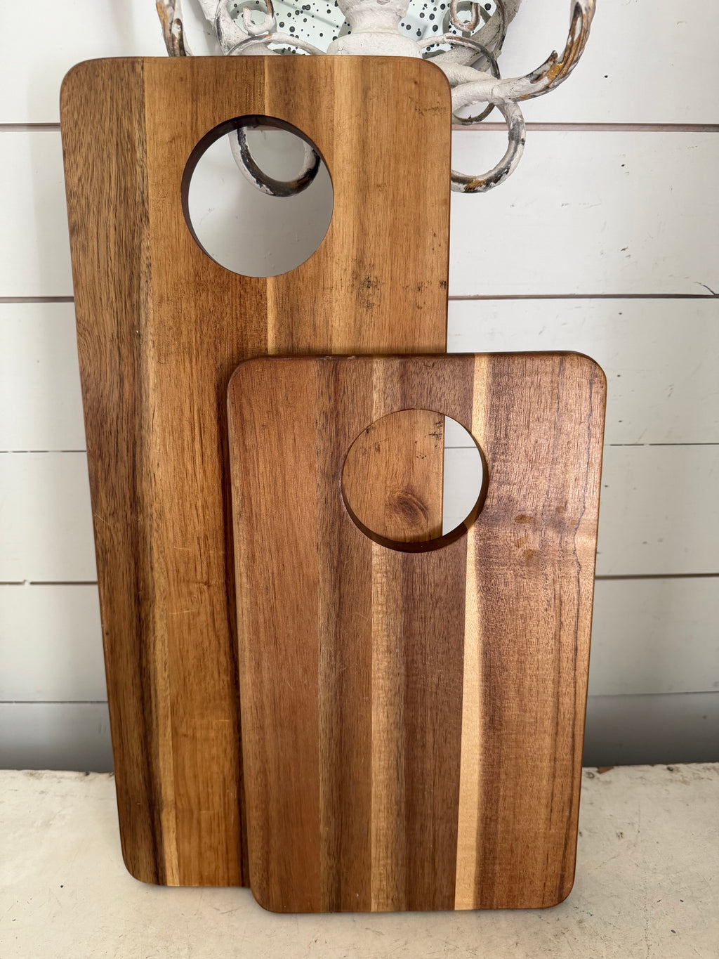 Set of cutting boards will get makeover round handle will be removed, and they will be made into rectangles