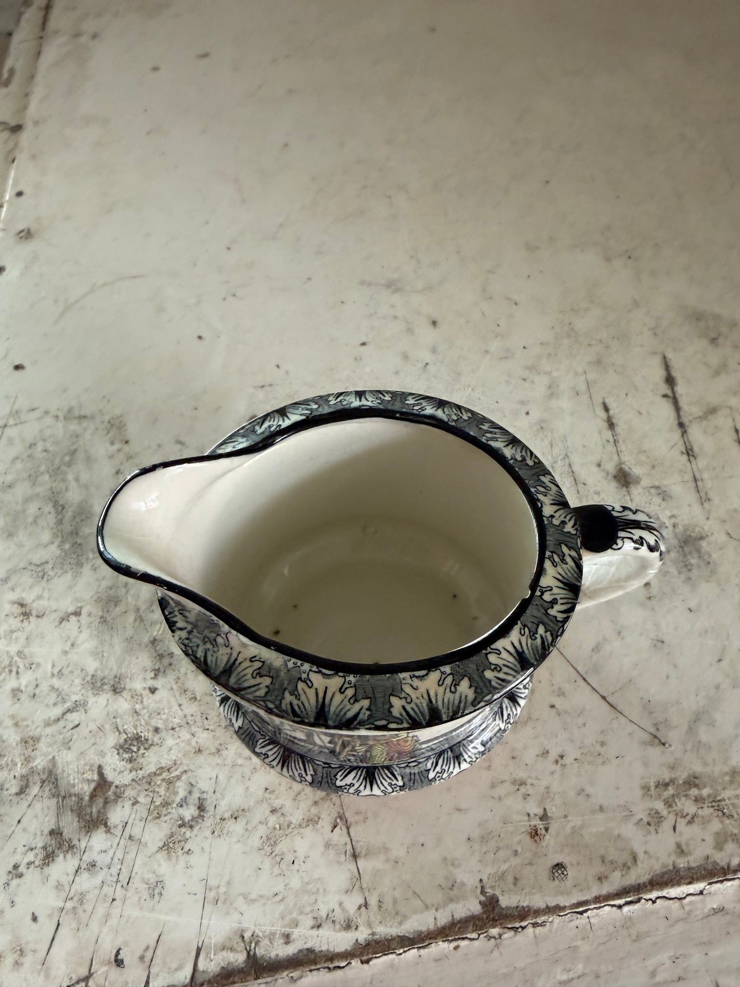 Antique Royal Doulton creamer from the "Old Moreton Hall" series.