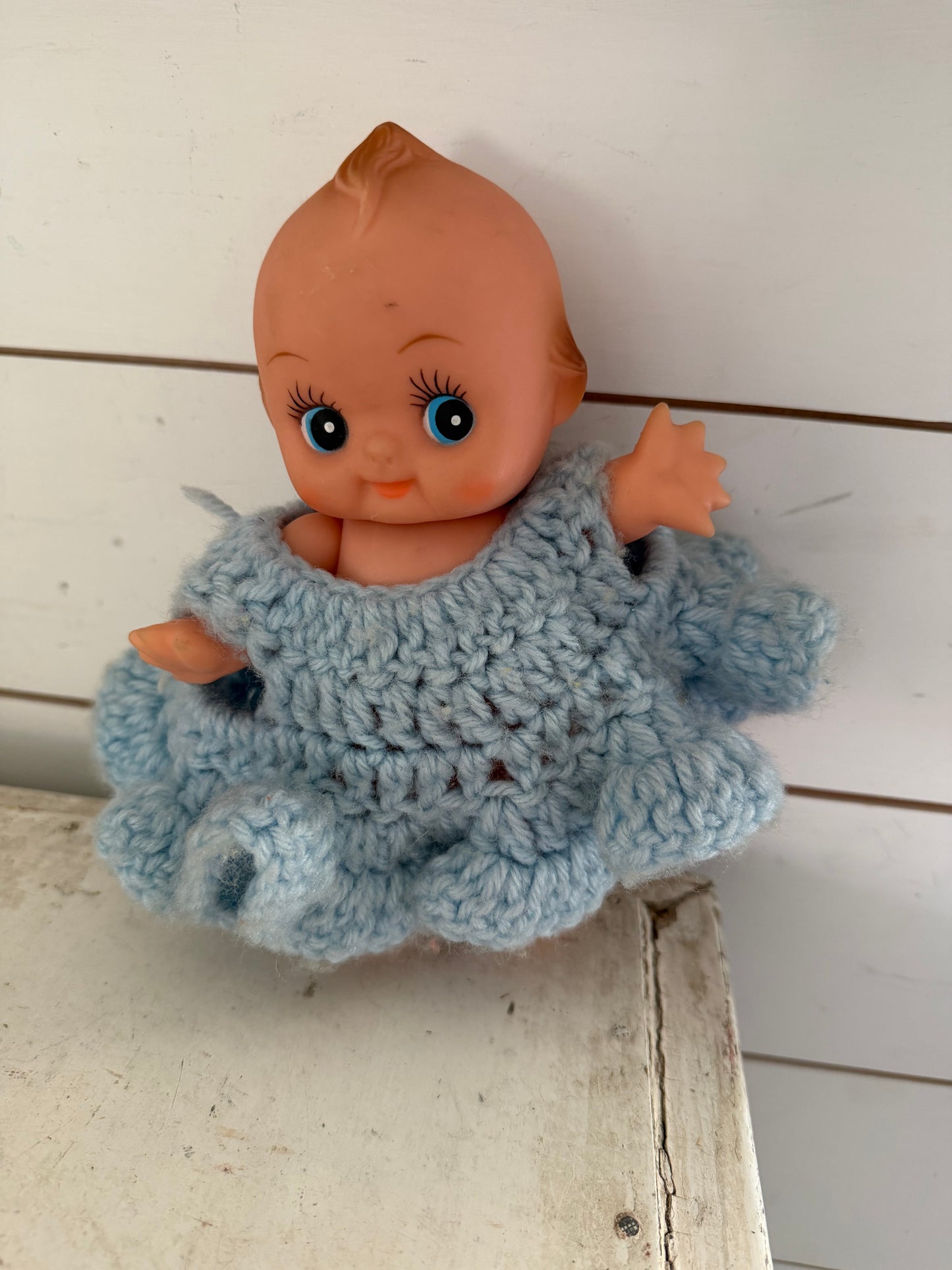 Kewpie doll with crochet dress