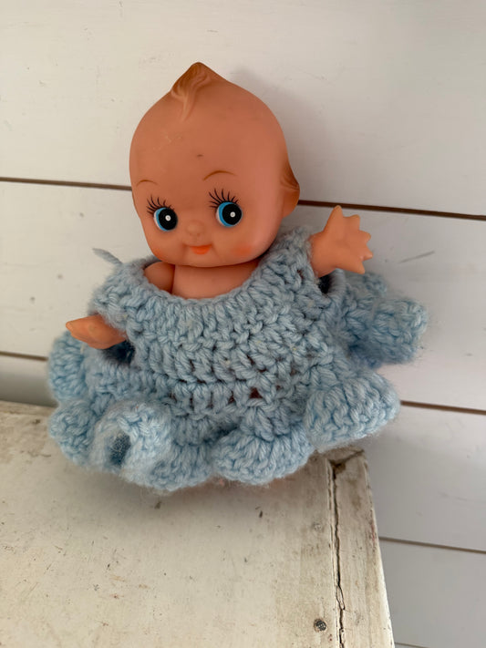 Kewpie doll with crochet dress