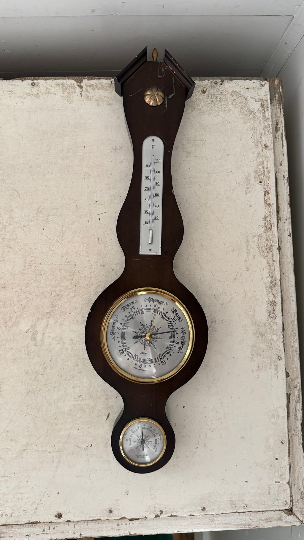 vintage German-made banjo-style weather station features a dark mahogany wood base, a barometer, a thermometer, and a hygrometer as is