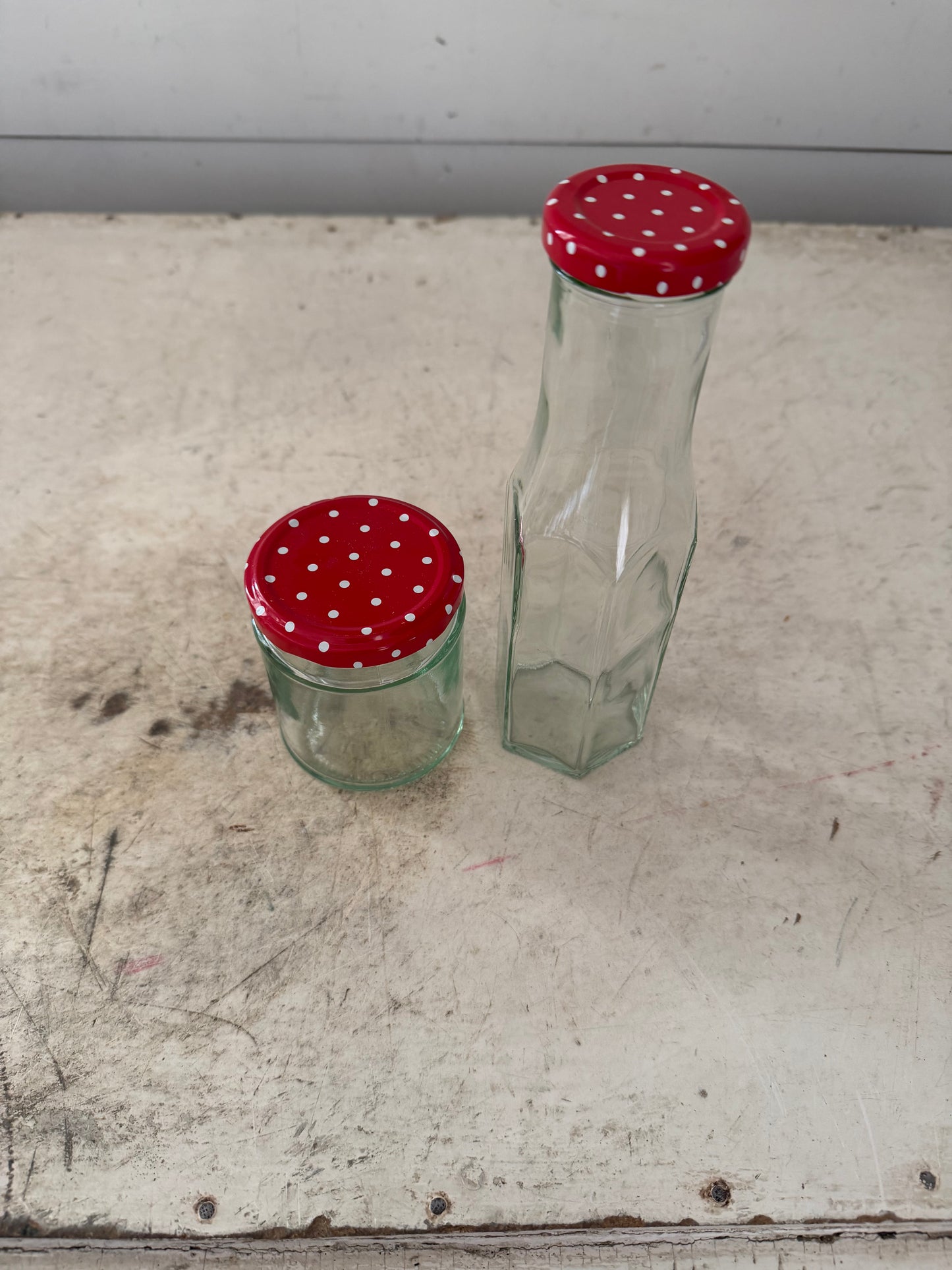 Set of English Bottles with red and white polka dot lids