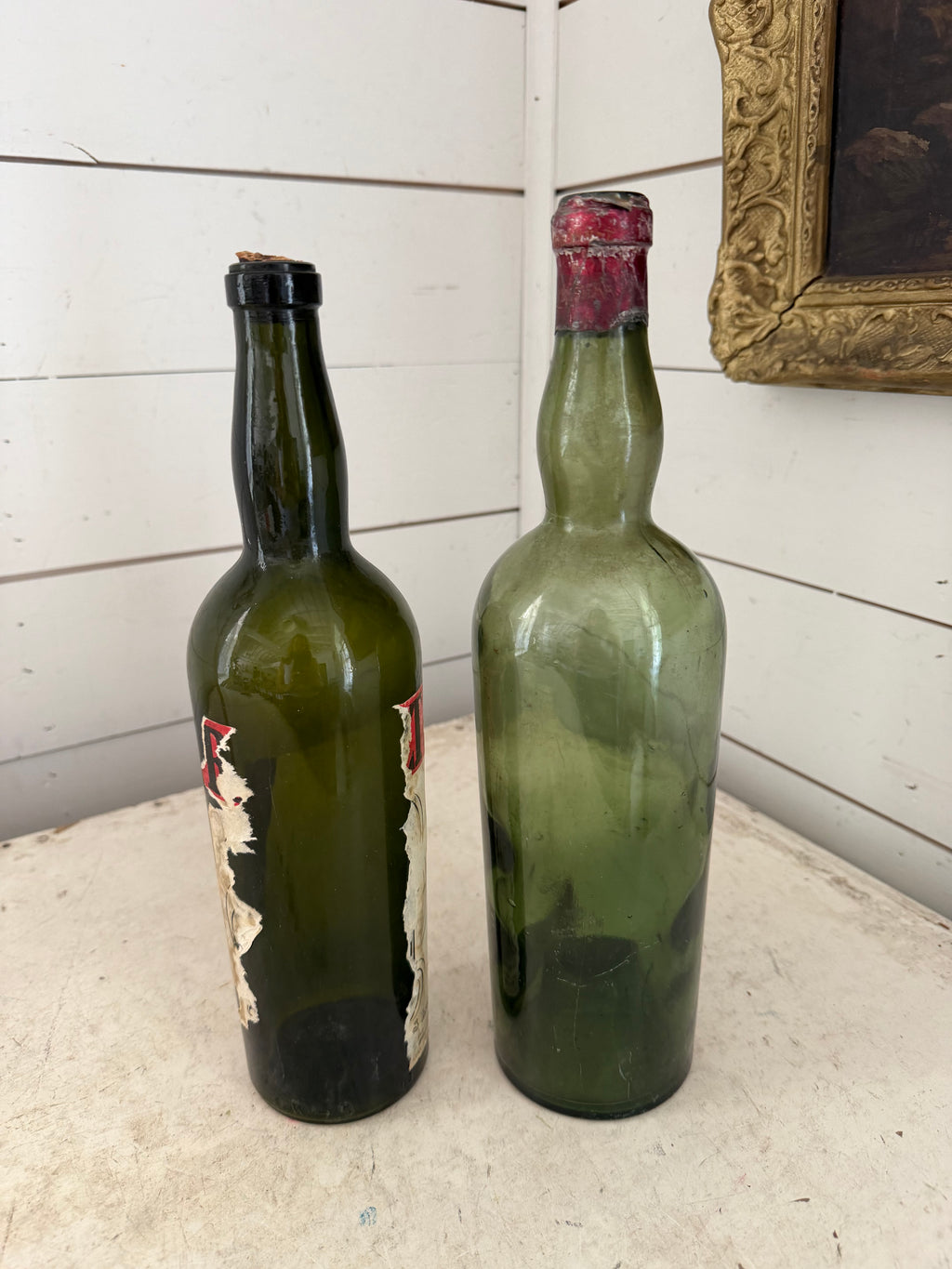 Pair of antique / vintage French style green bottles
