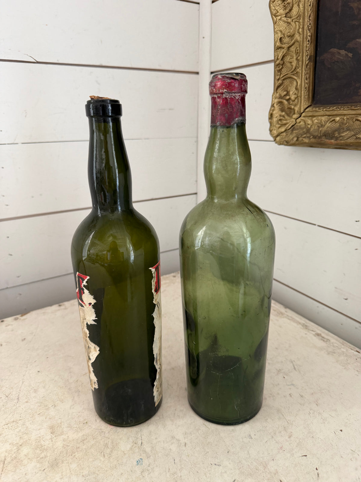 Pair of antique / vintage French style green bottles