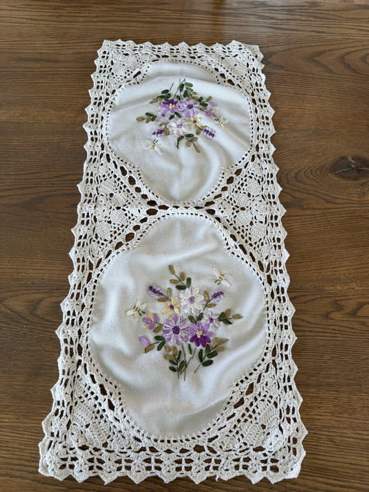 Handmade white cotton crochet lace table runner with purple floral ribbon embroidery