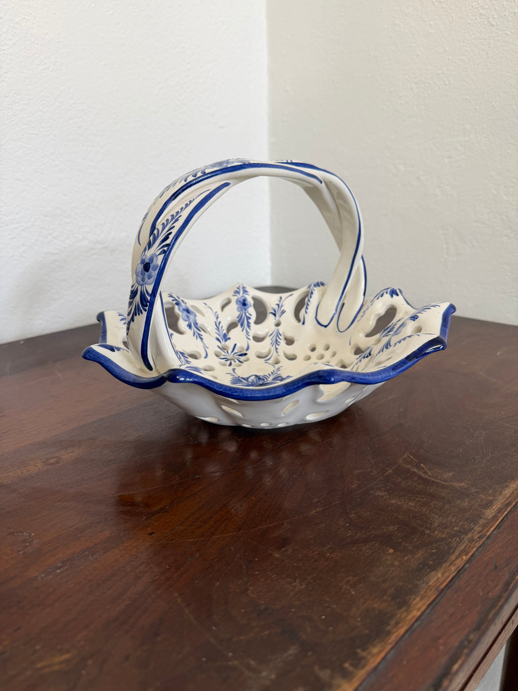 Vintage hand-painted ceramic reticulated (pierced lattice) basket or bowl with a braided handle