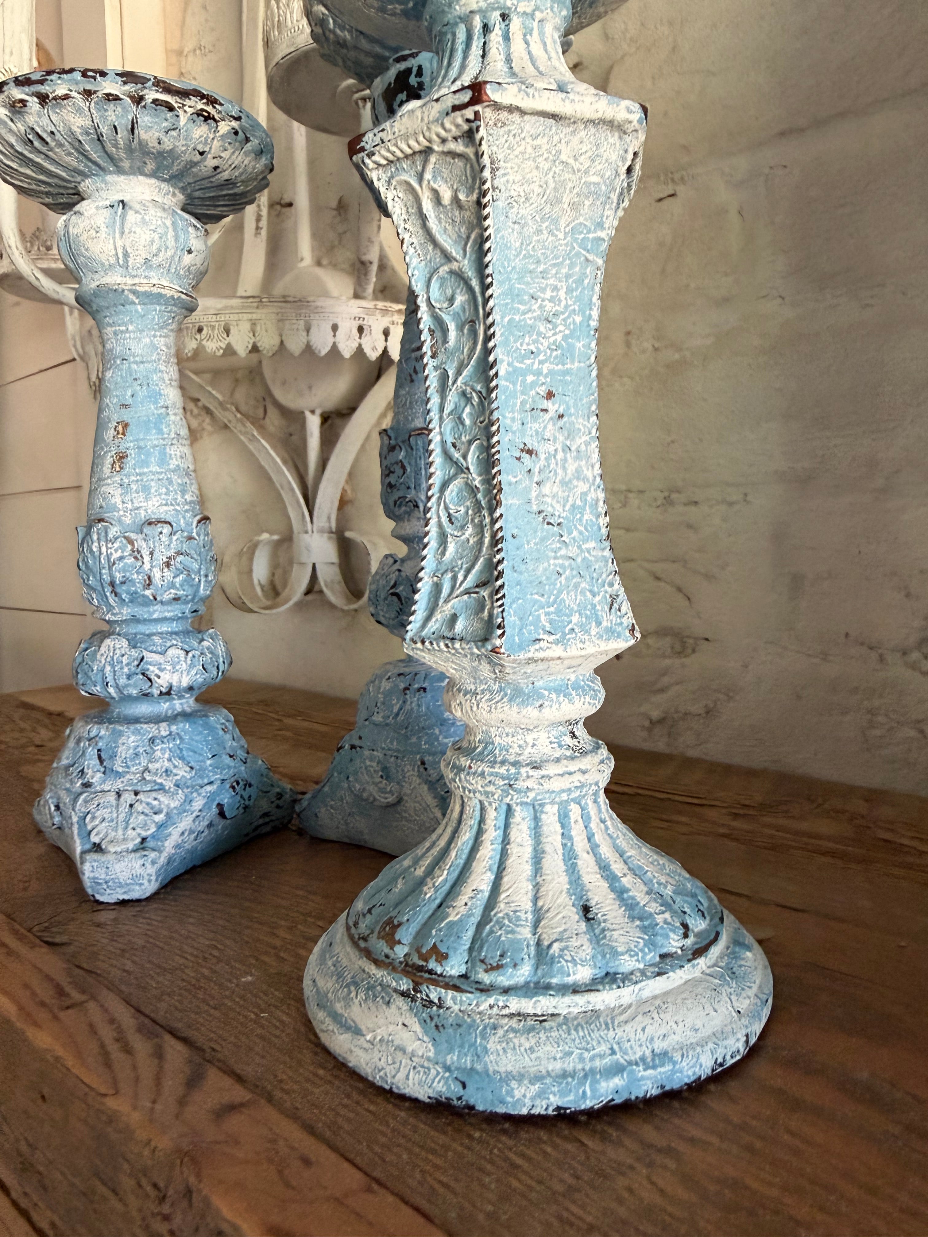 Set of three chippy French country candlesticks