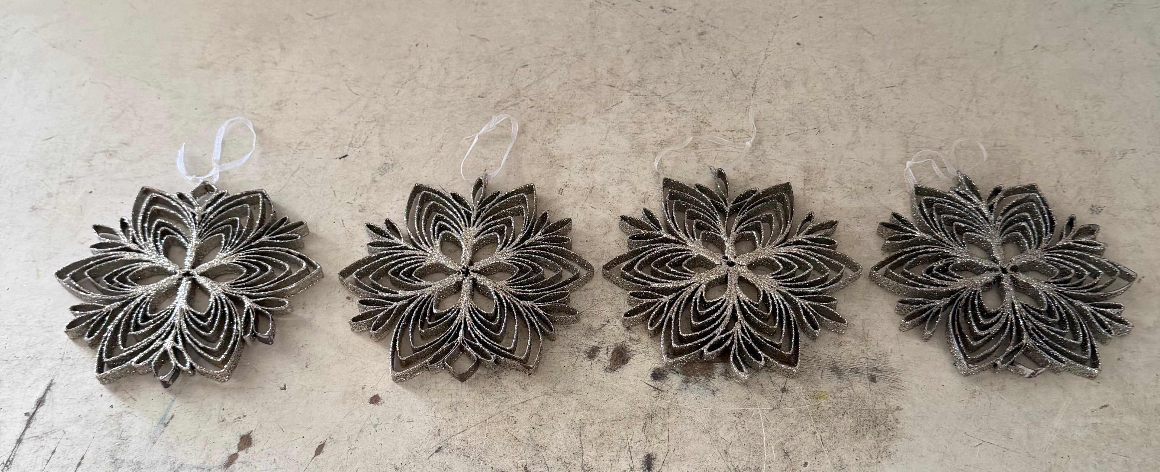 Set of metal glitter, snowflake ornaments